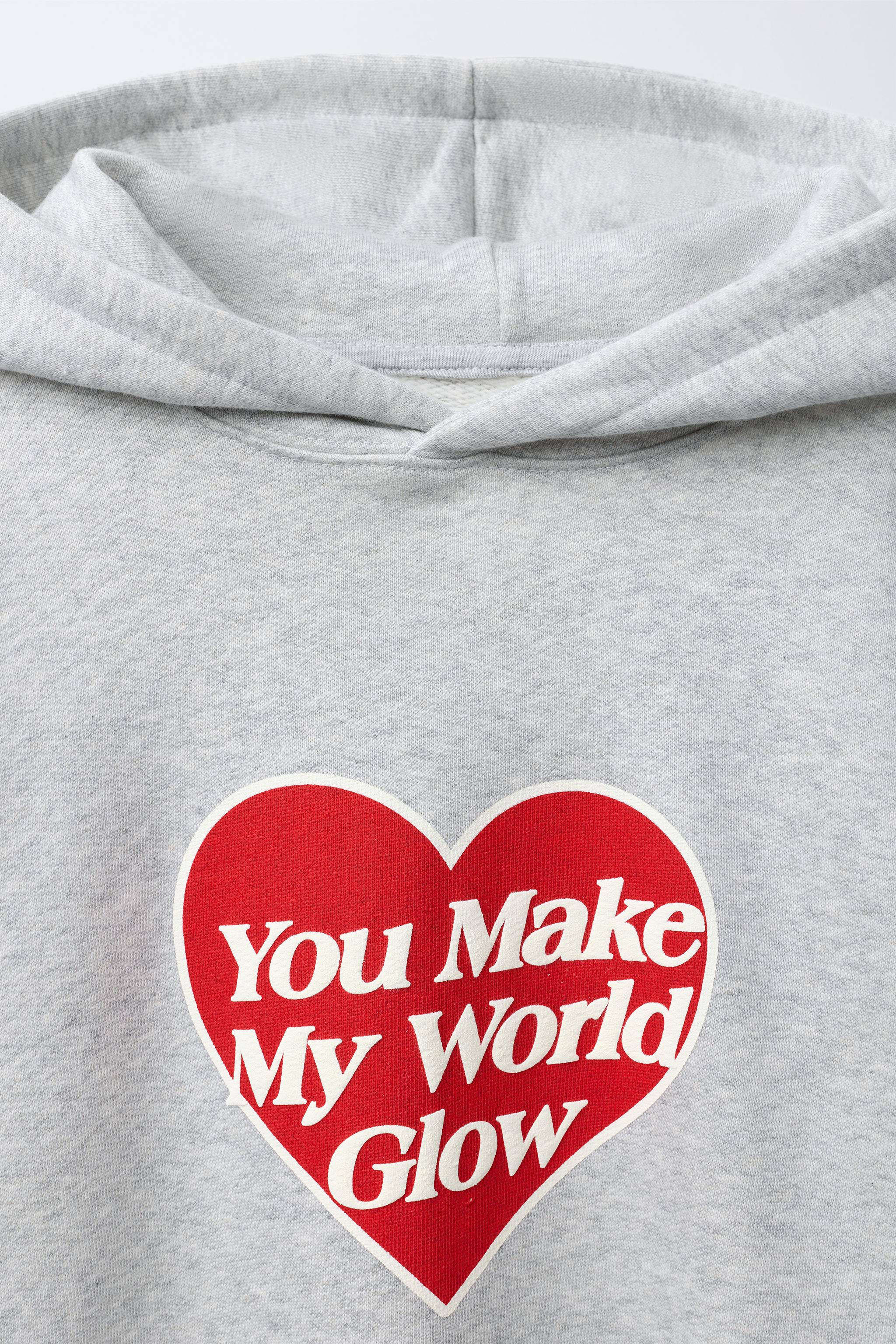 HEART PRINT SWEATSHIRT