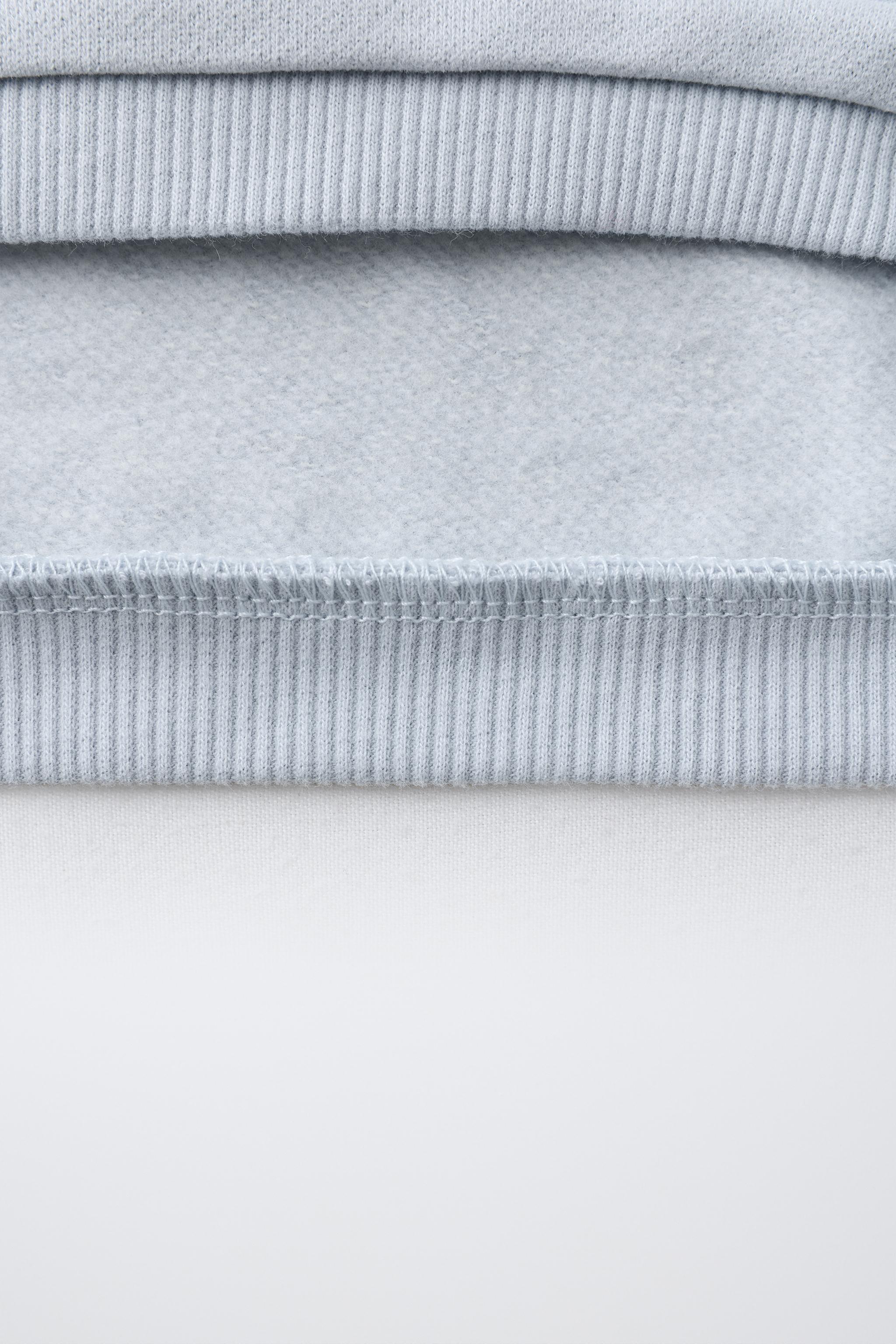 SWEAT À FLEURS AU CROCHET