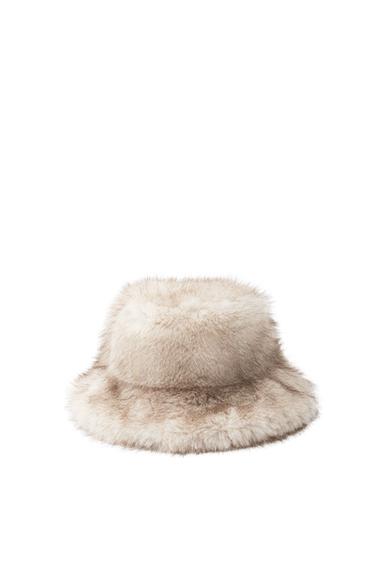 Front view of beige plush hat with wide brim