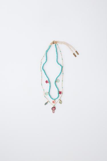 SET 2 VÒNG CỔ HẠT VAIANA © DISNEY - Màu ngọc lam từ Zara