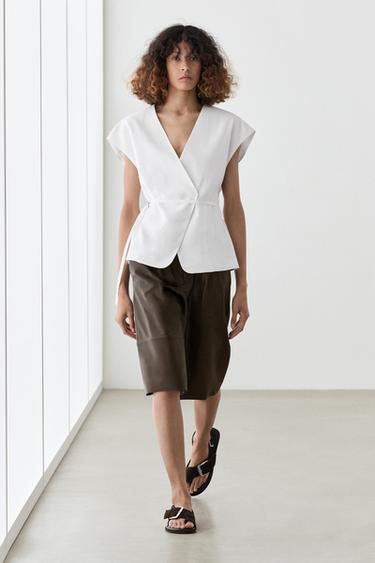 Veste sans manches croisée à nouer 100 % lin - Blanc cassé de Zara