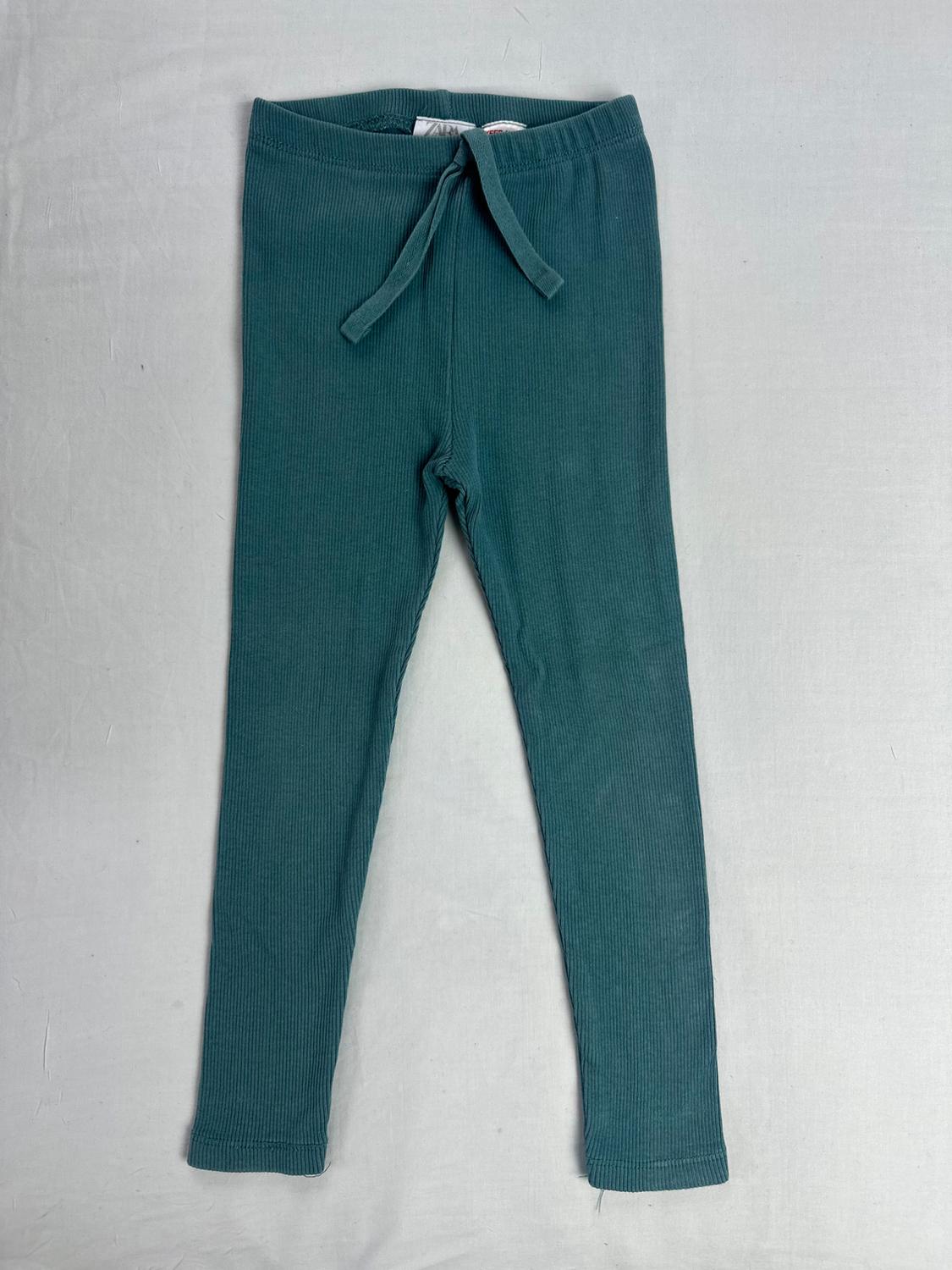 Teal green leggings with a ribbed texture, an elastic waistband with a drawstring, and a zara label, on a light gray background.