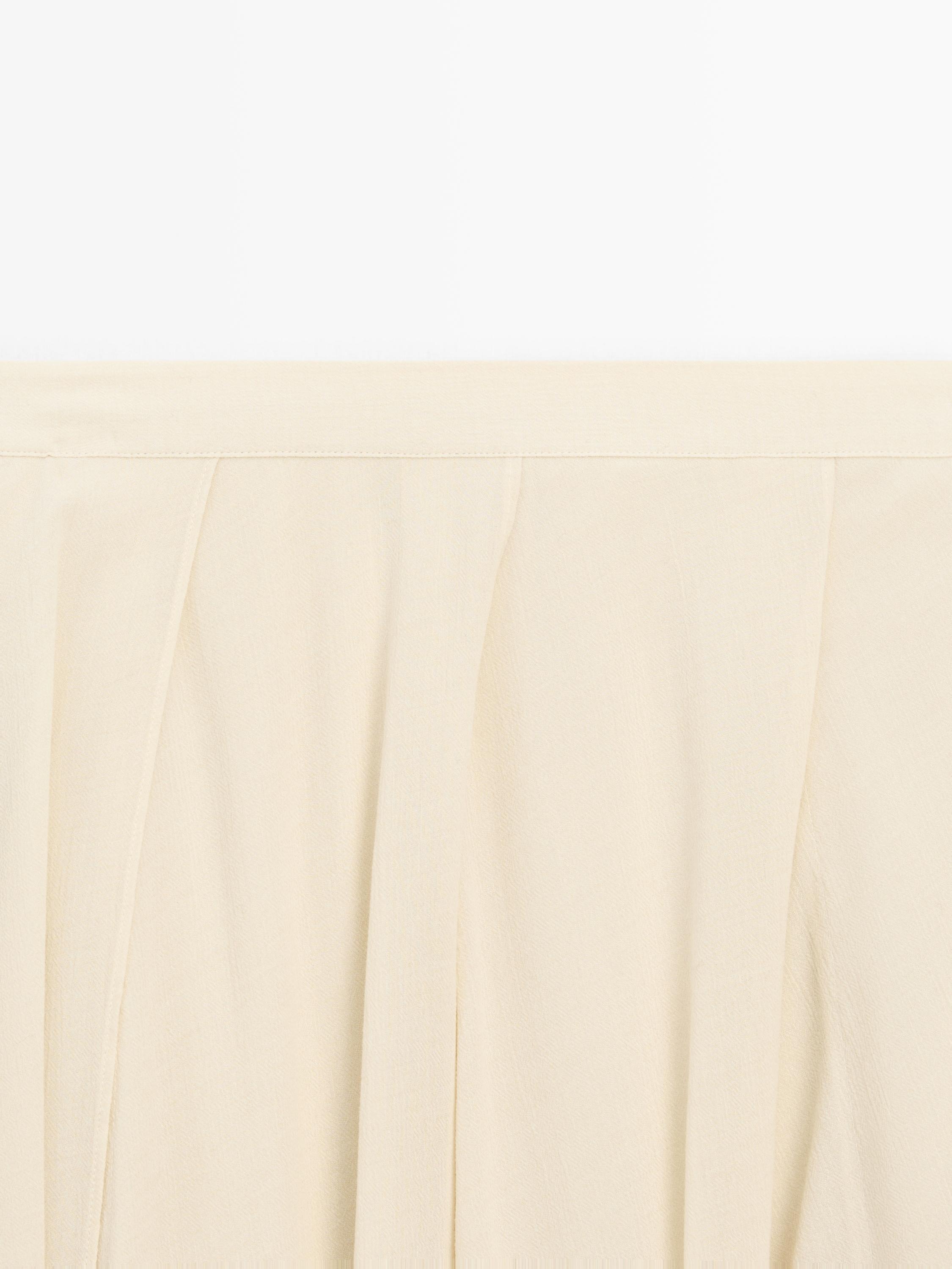 Flowing midi skirt with ruffles