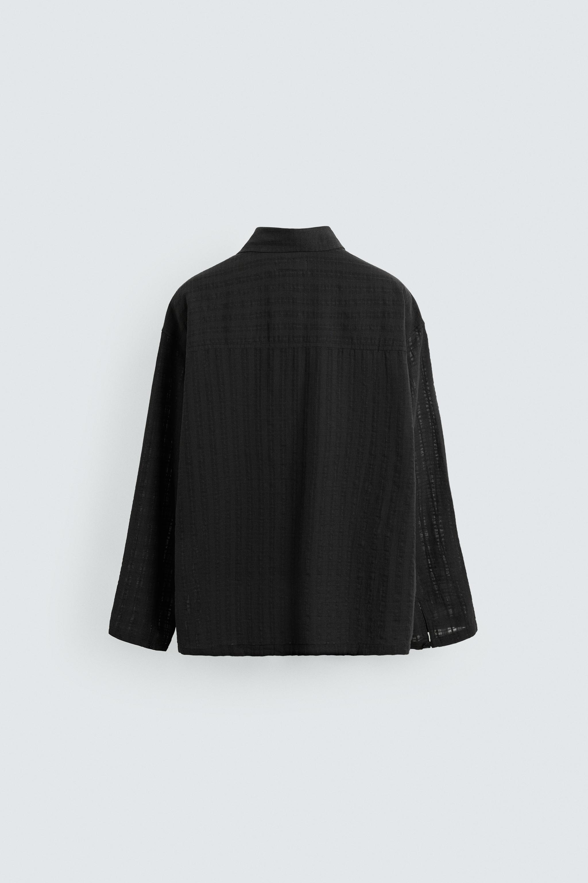 CHEMISE POLO STRUCTURÉE SEMI-TRANSPARENTE
