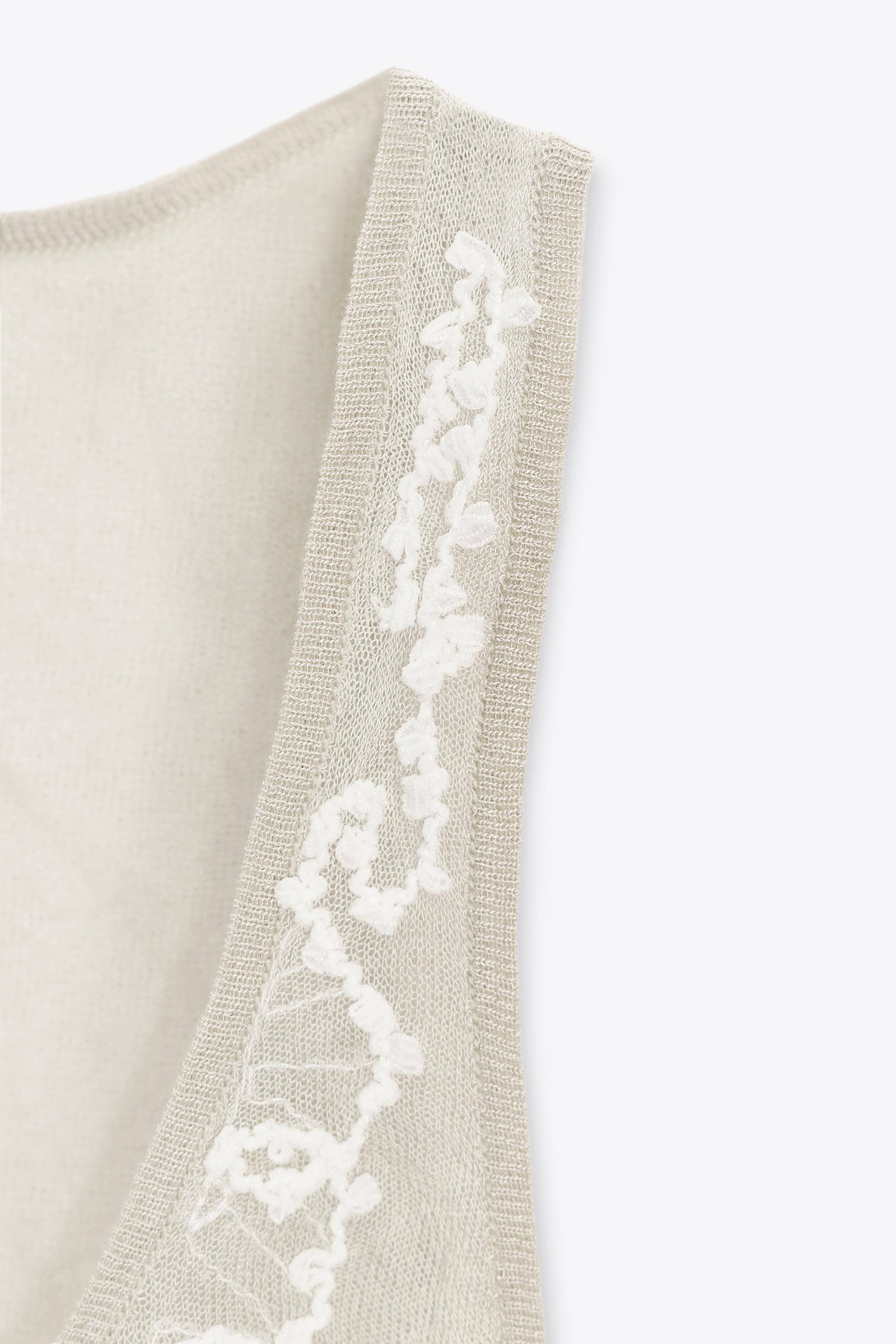 TOP SEMI-TRANSPARENT EN MAILLE TEXTURÉE