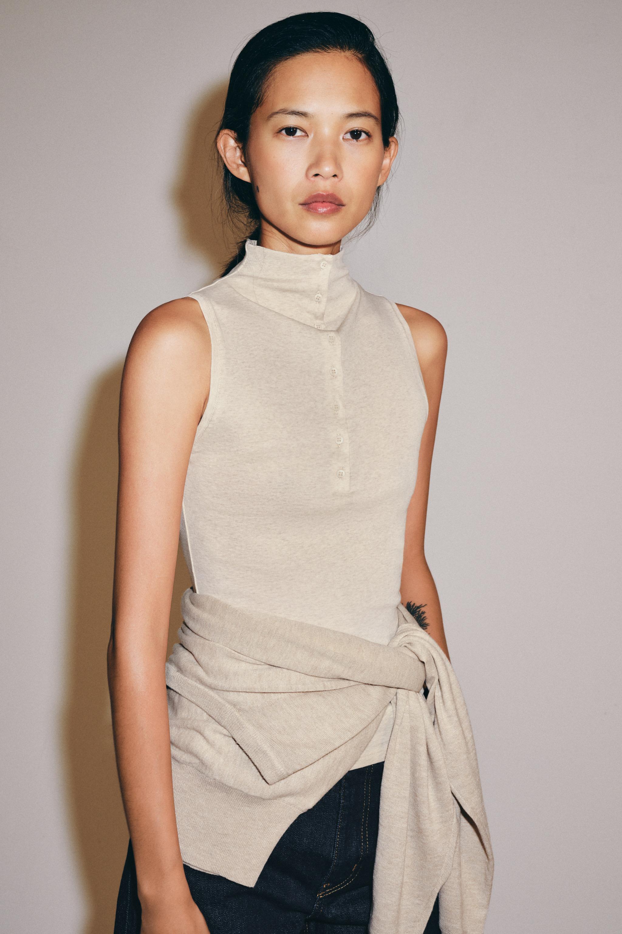 BUTTON-FRONT HIGH NECK TOP — Beige marl