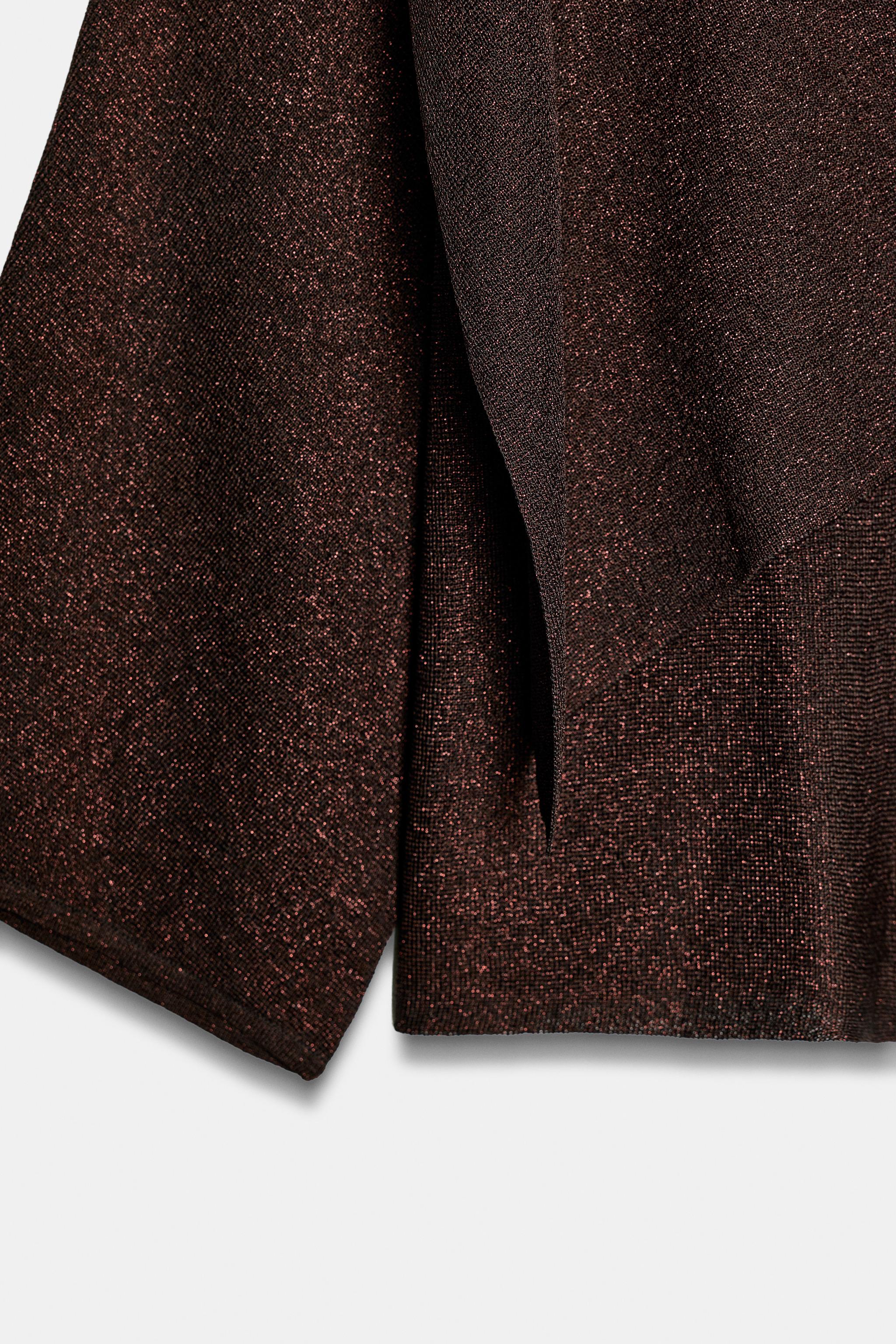 PULL CAPE EN MAILLE À FIL MÉTALLISÉ