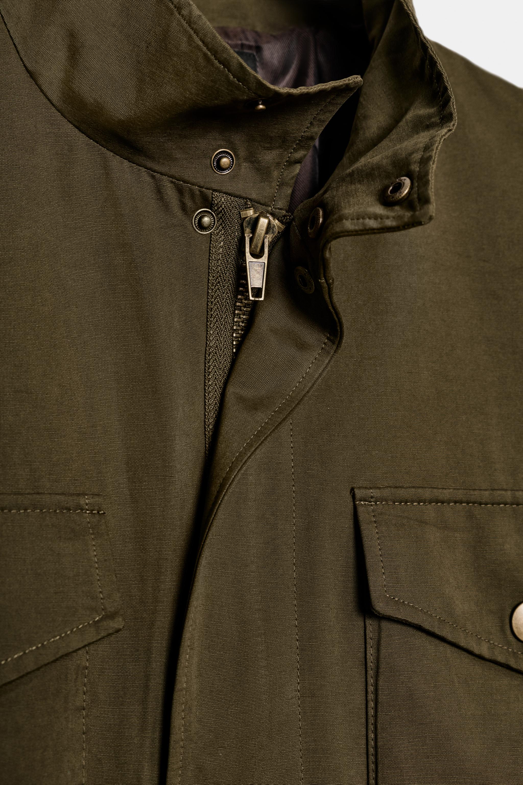 VESTE À ÉPAULETTES ET POCHES