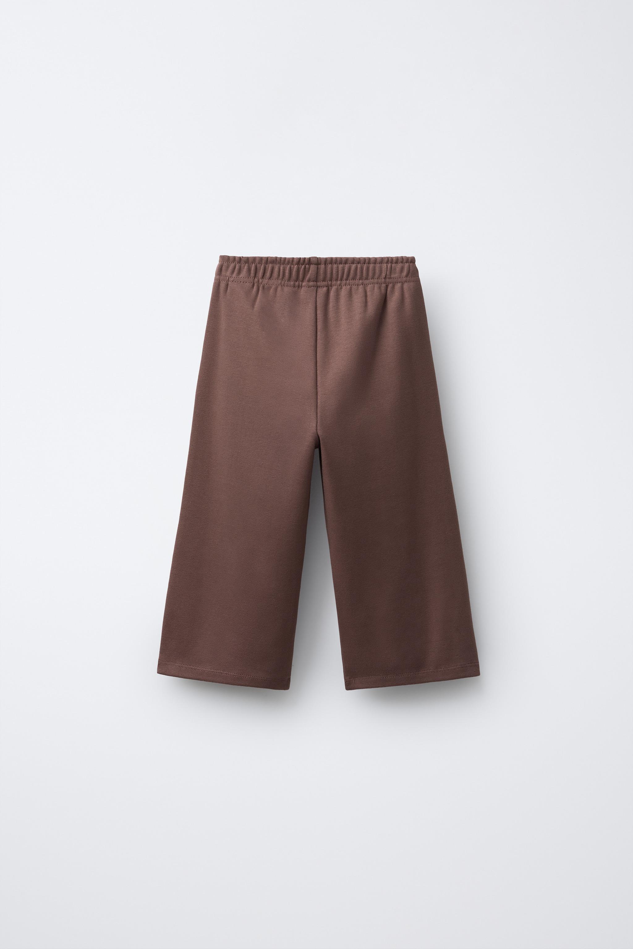 WIDE LEG RAISED TEXT PLUSH PANTS