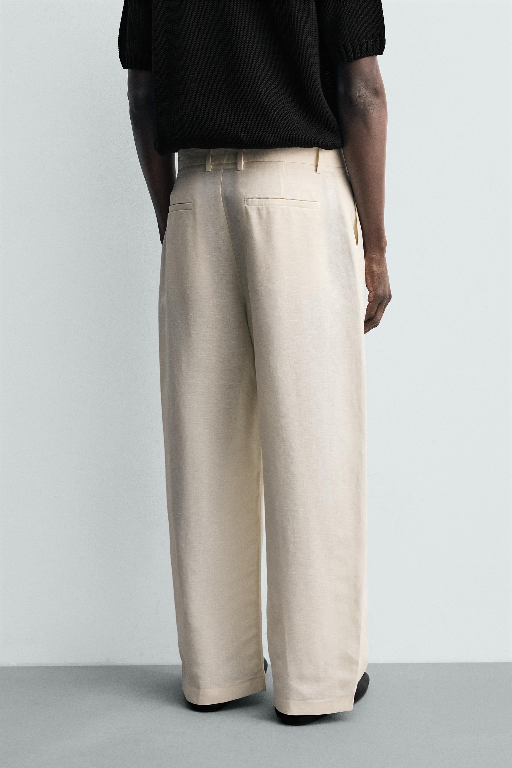 PANTALON COUPE DÉCONTRACTÉE À PLIS