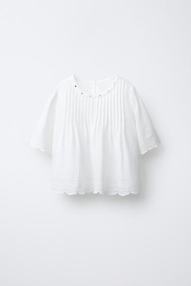 BLUSA BORDADOS E TACHAS - Branco-marfim da Zara - Imagem 0
