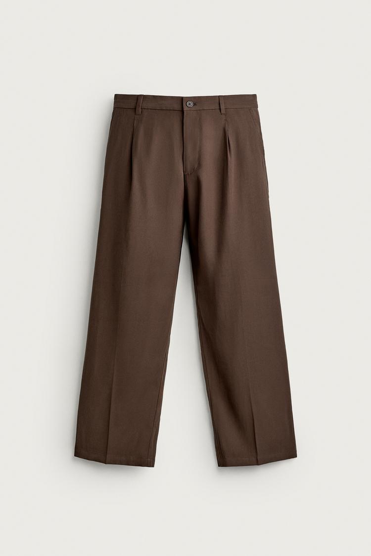 Pantalon relaxed fit pliegues