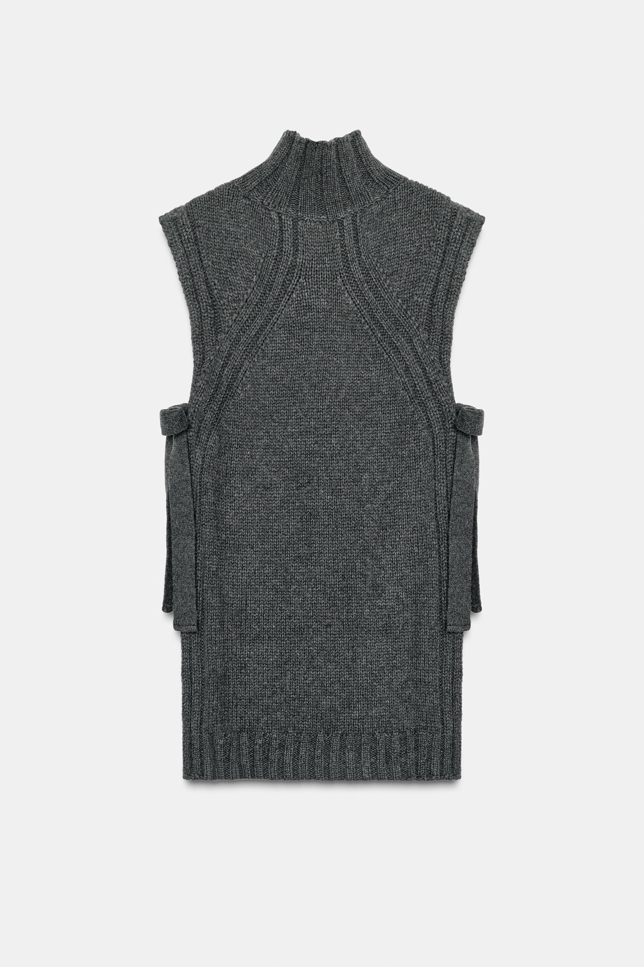 GILET EN LAINE AVEC OUVERTURES