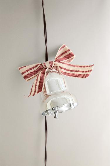 Guirlande de Noël décorée de cloches de Noël et de texte joyeux Noël Guirlande de Noël décorée de cloches de Noël et de texte joyeux Noël