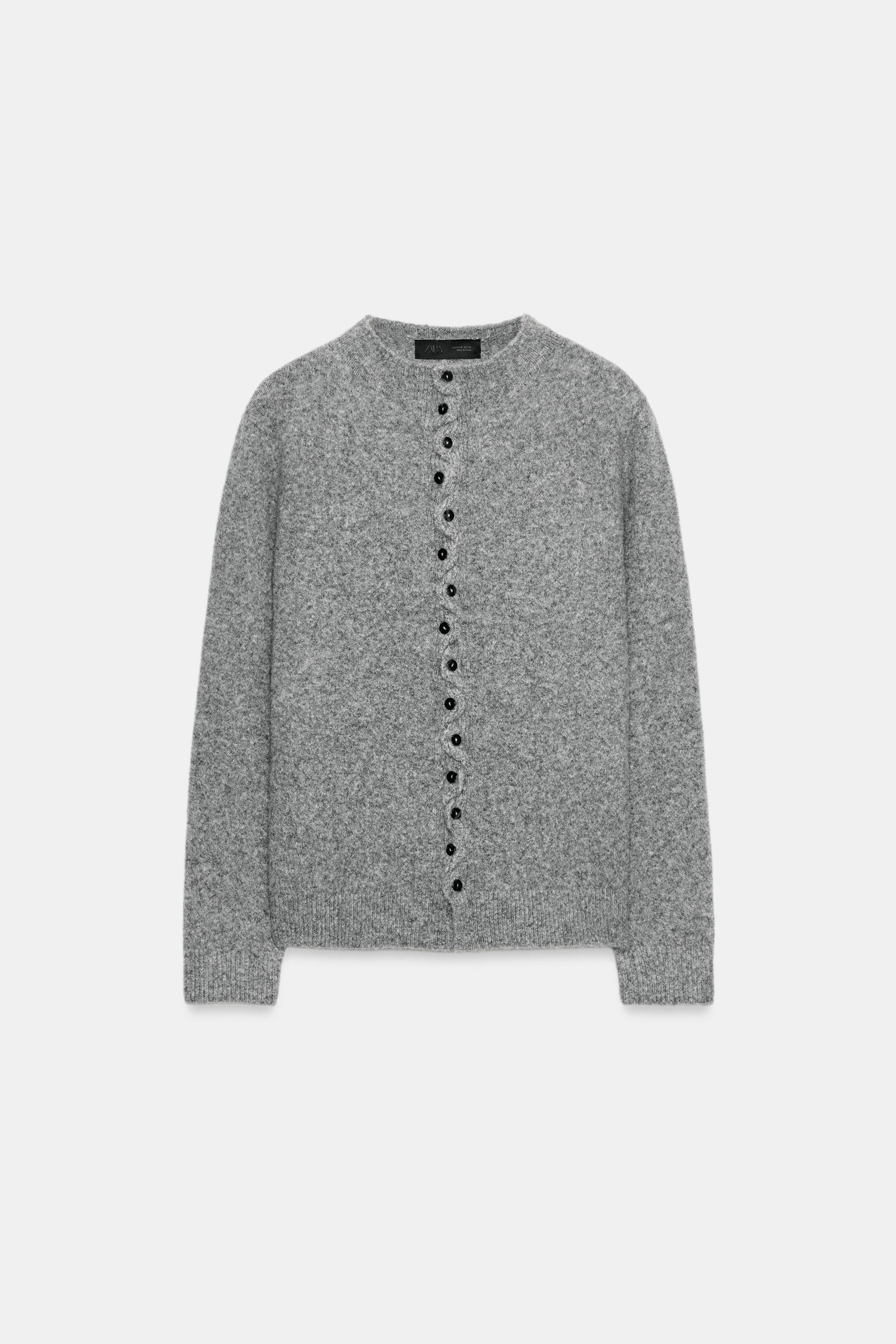 CARDIGAN WITH BUTTON AND RUFFLE CLOSURE