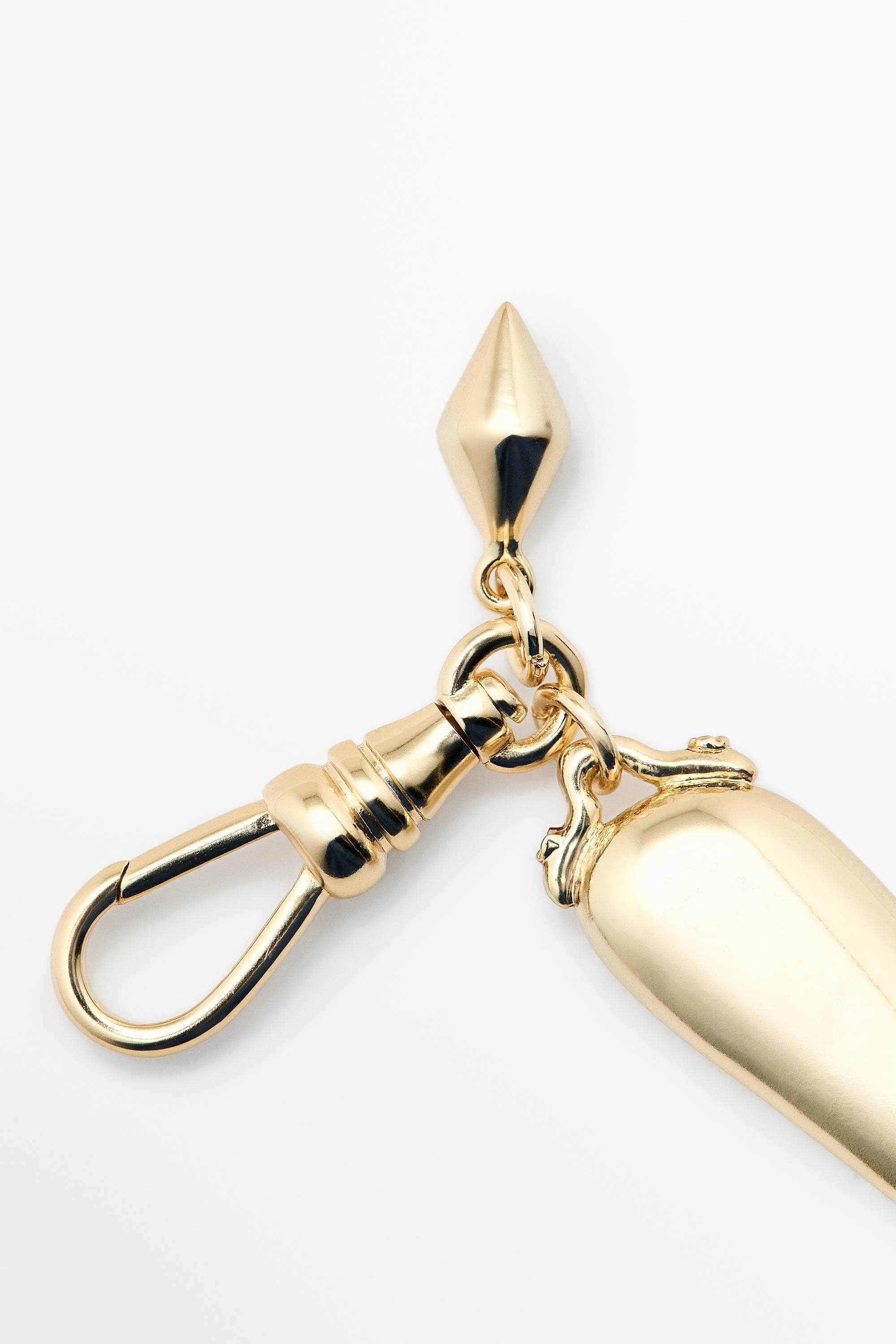 Elongated charm pendant