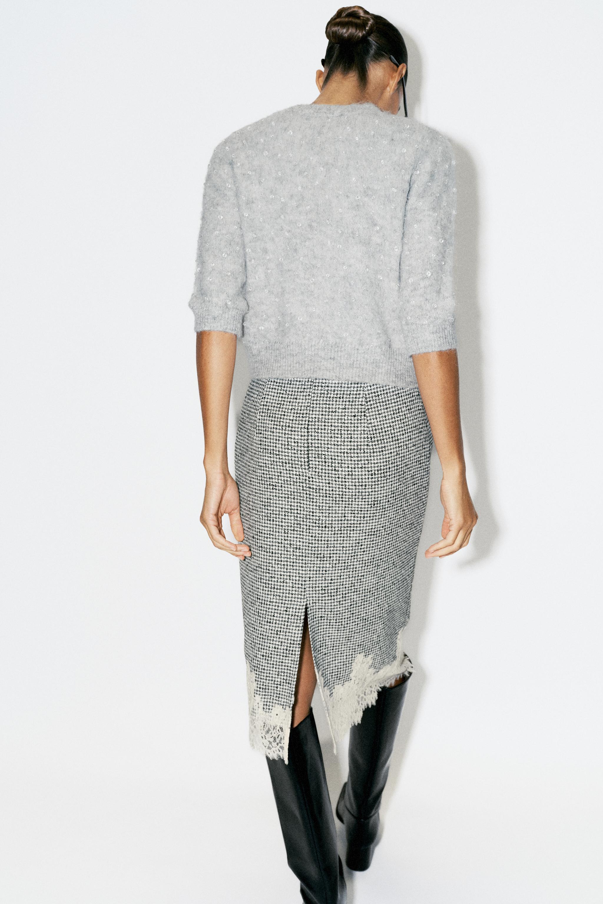 BRUSHED EFFECT BEADED KNIT SWEATER