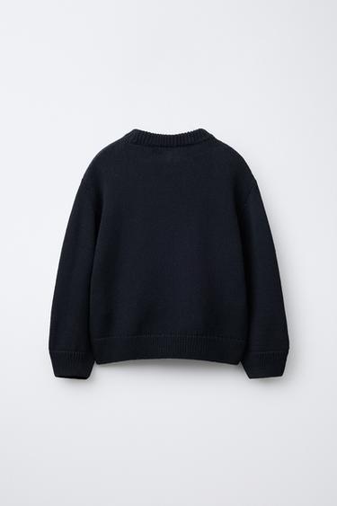 PULL EN MAILLE AVEC ÉTOILE ET CLOUS - Bleu marine de Zara - Image 1