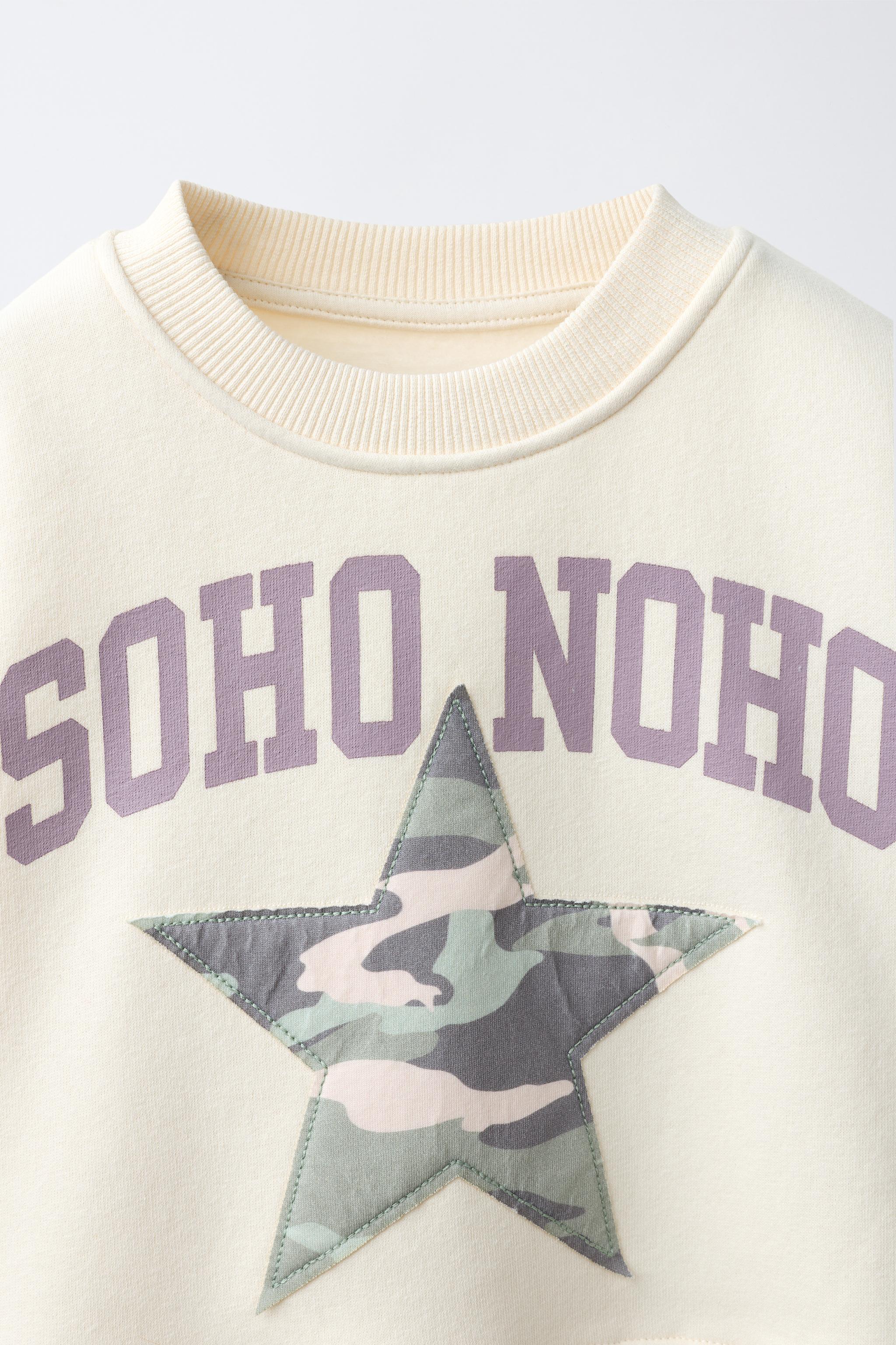 STAR PATCH SWEATSHIRT