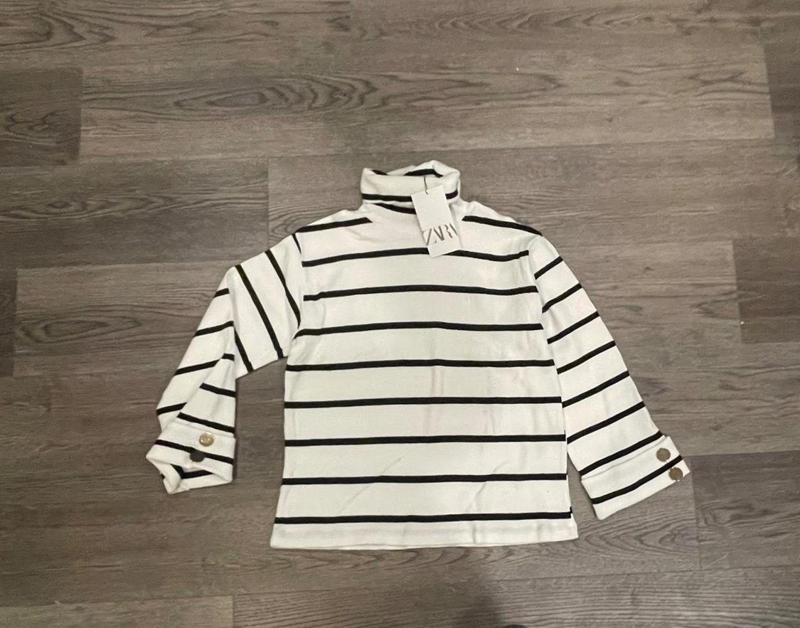 BUTTONED STRIPED SWEATER