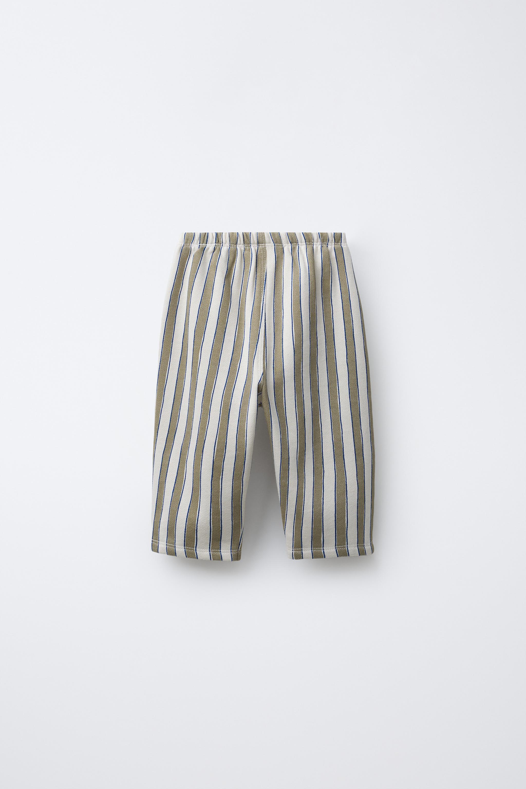 STRIPED BAGGY PANTS WITH LABEL