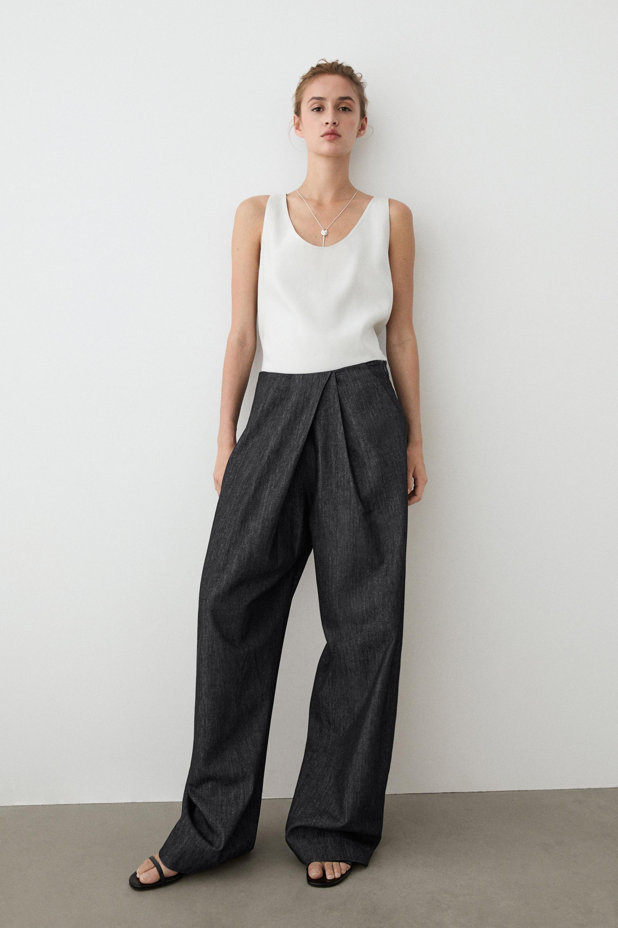 High-waist pants with crossover detail