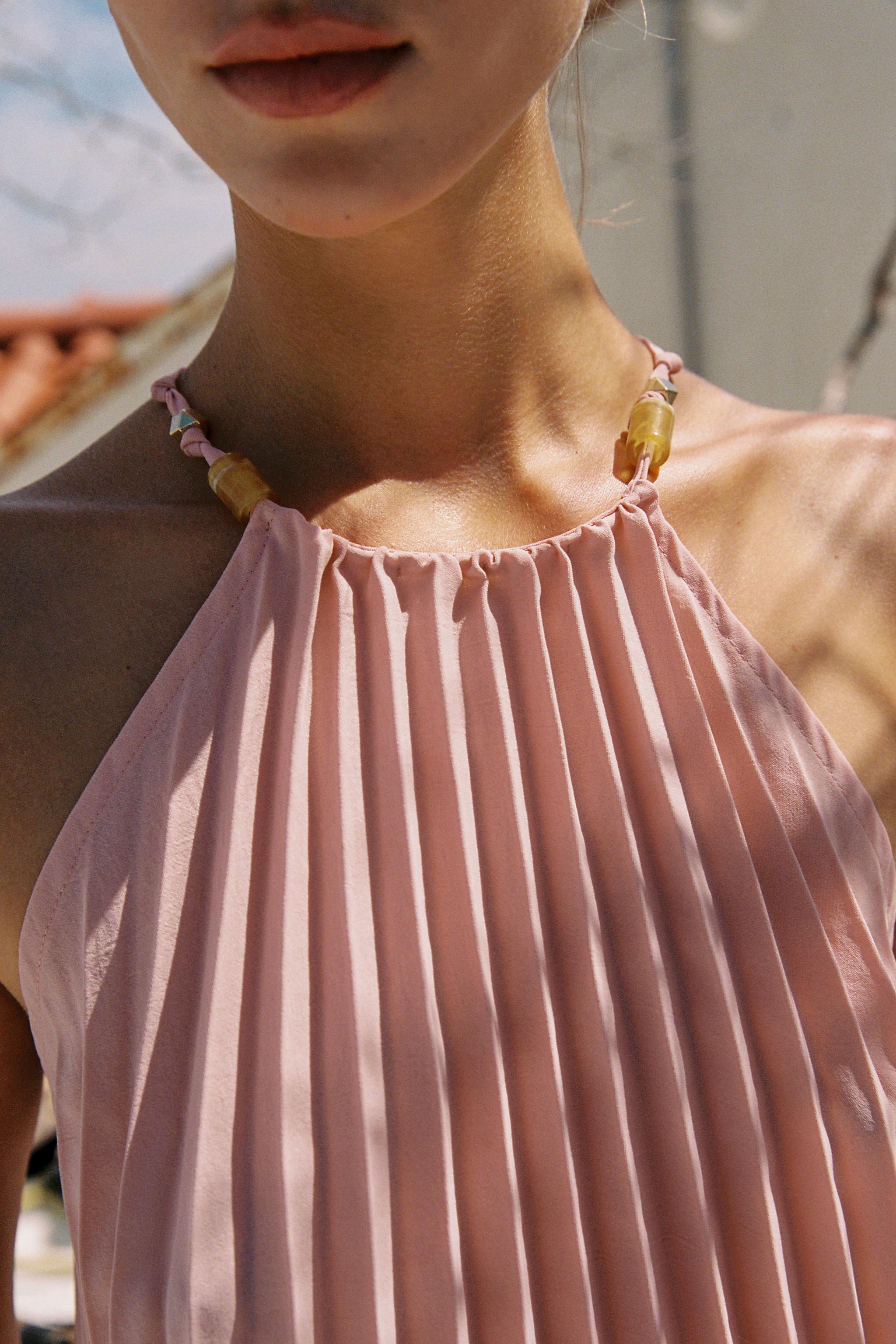 PLEATED BEADED HALTER TOP