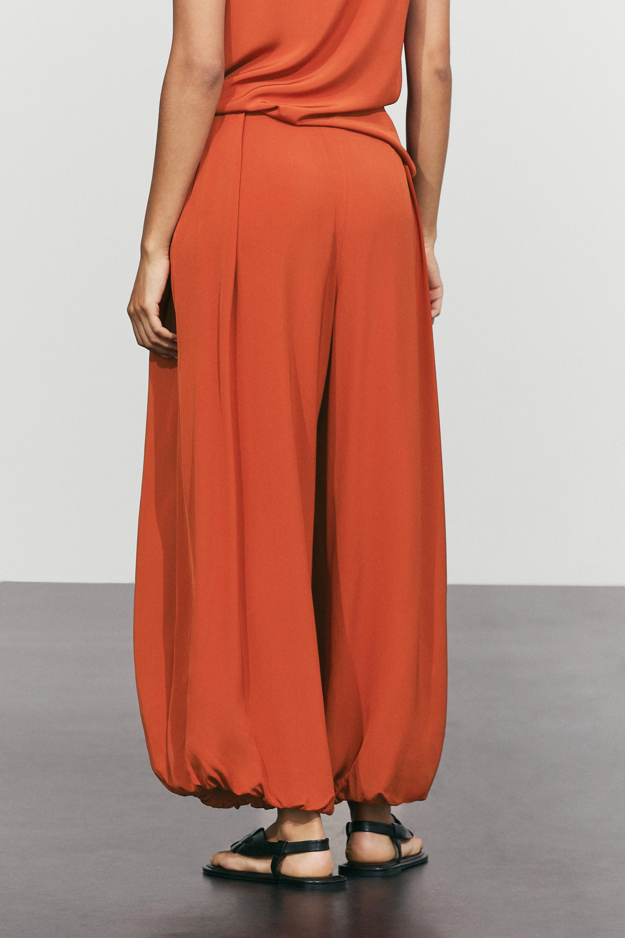Pleated sarouel trousers total look