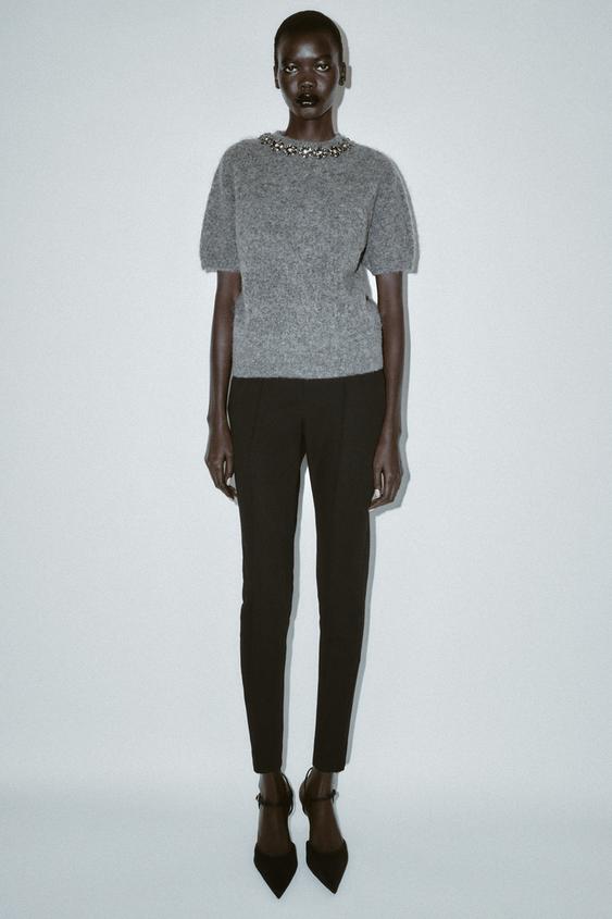 HIGH-WAISTED SLIM PANTS WITH ZIPPER HEM