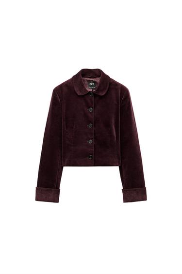 Front view of a burgundy cropped jacket with buttons and a round neck.