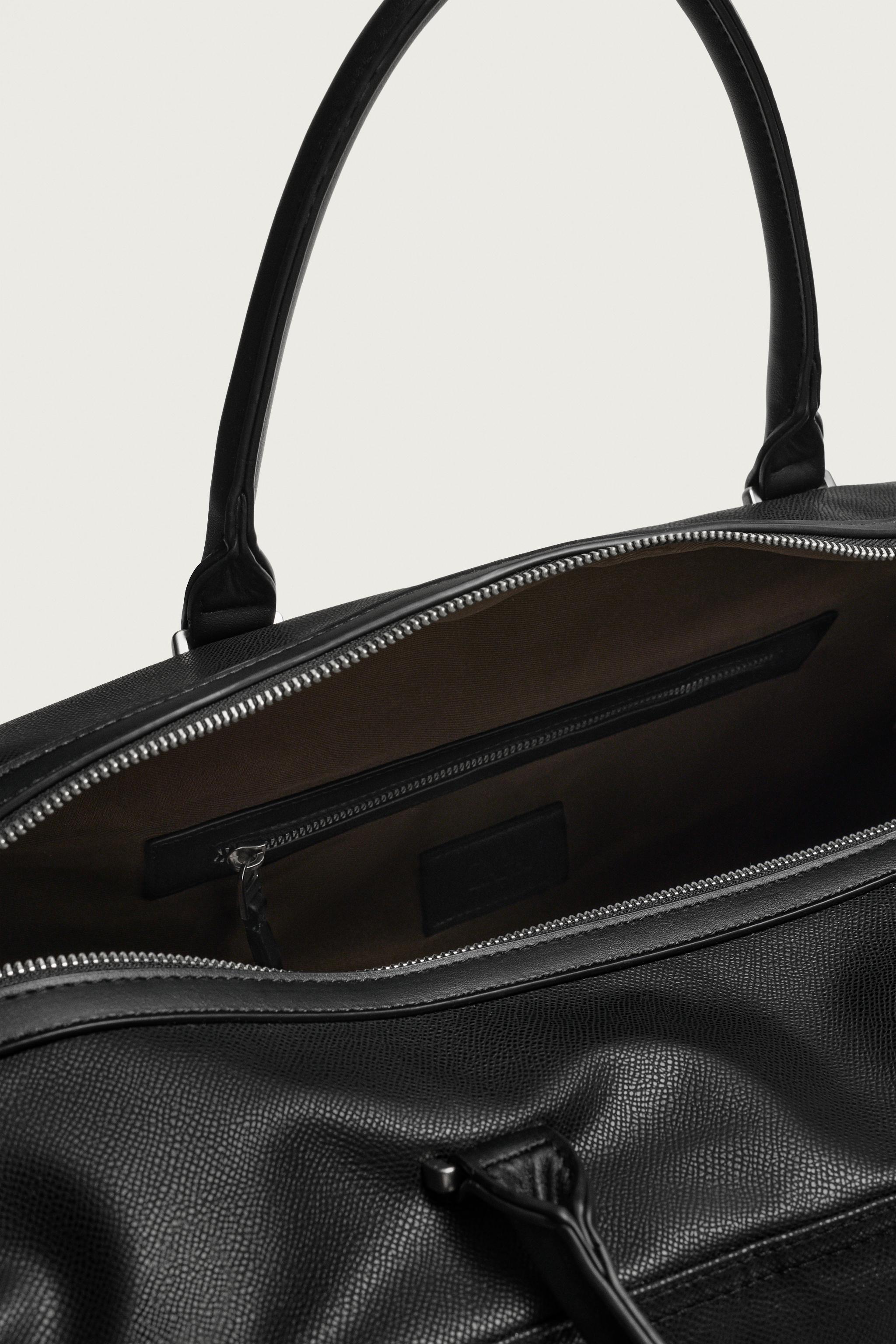 TEXTURED TRAVEL BAG
