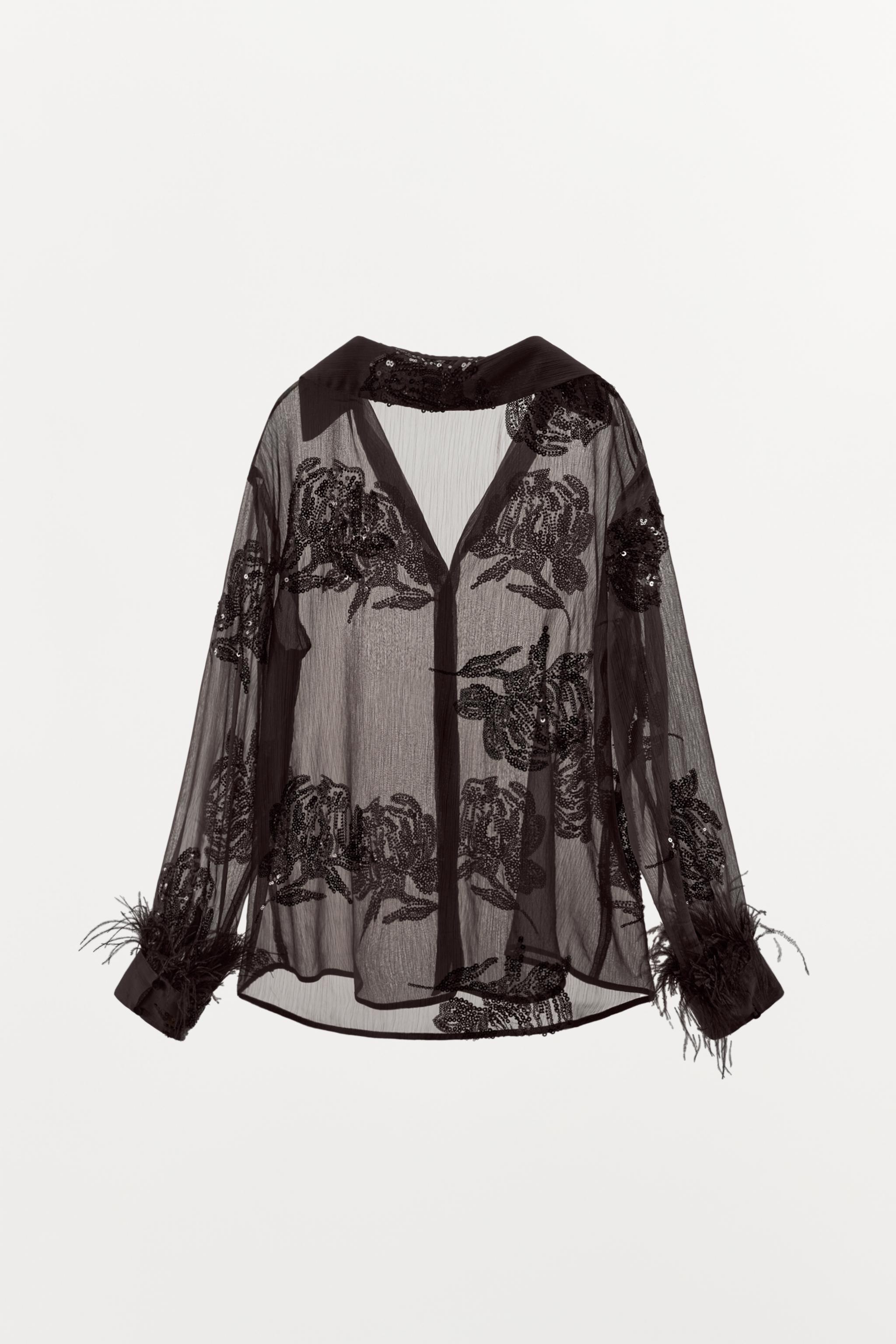 BLOUSE SEMI-TRANSPARENTE PAILLETTES PLUMES