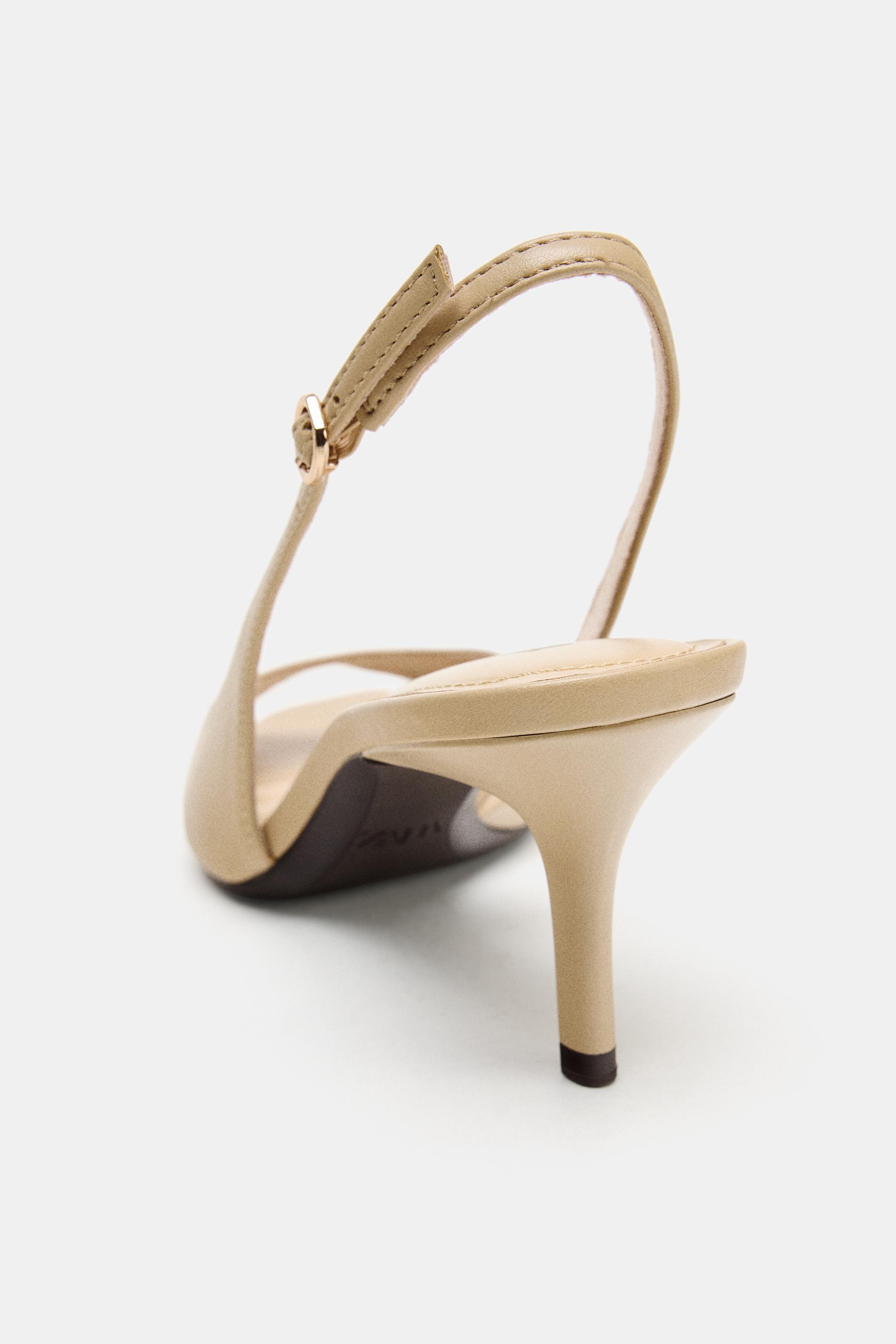 ASYMMETRIC HEELED SANDALS