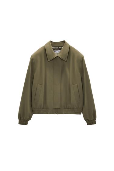 BOMBER JACKET WITH TOPSTITCHING AND POCKETS