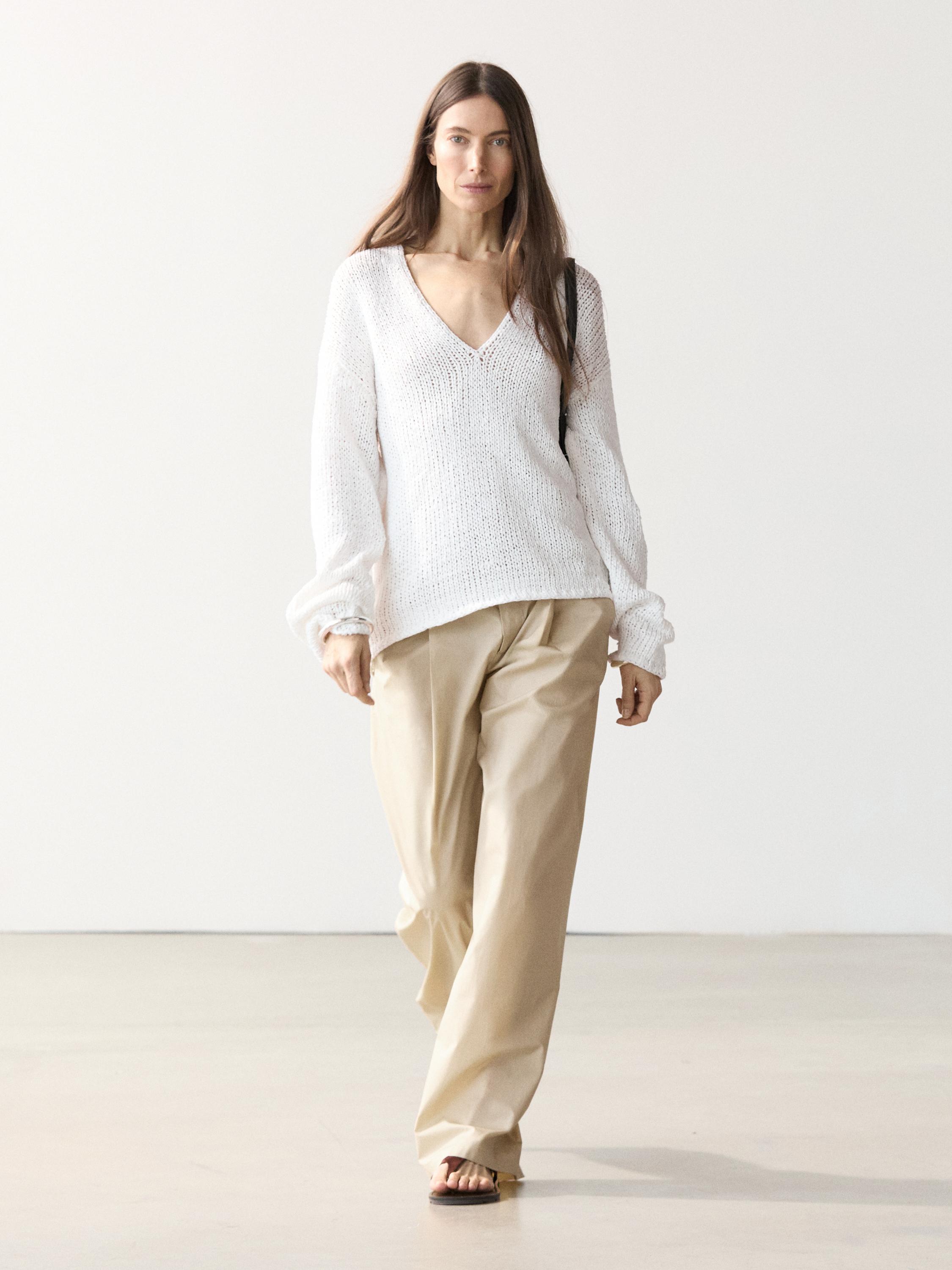 Pull en maille ajourée à col V