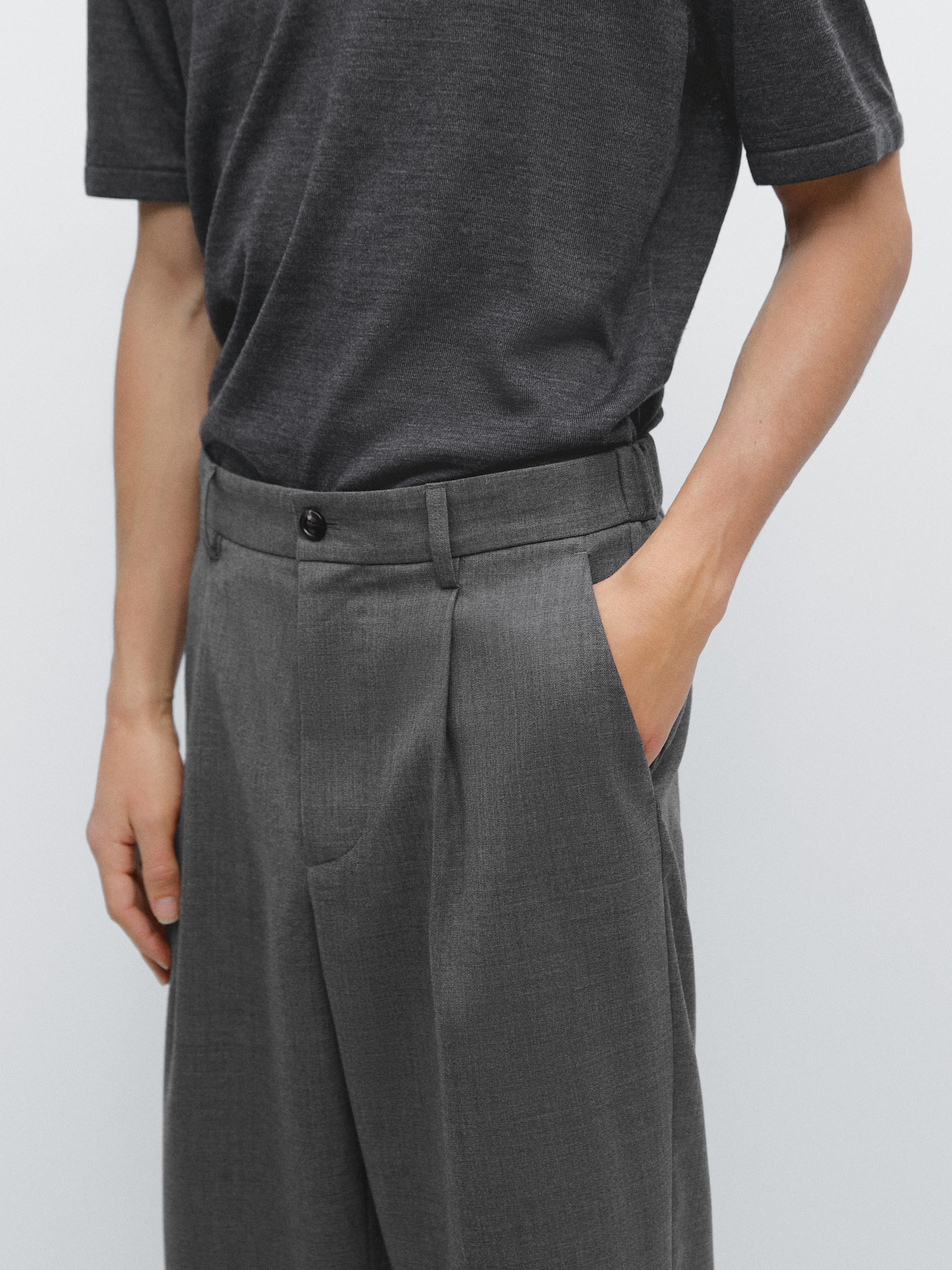 Pantalon relaxed fit à pinces en laine froide