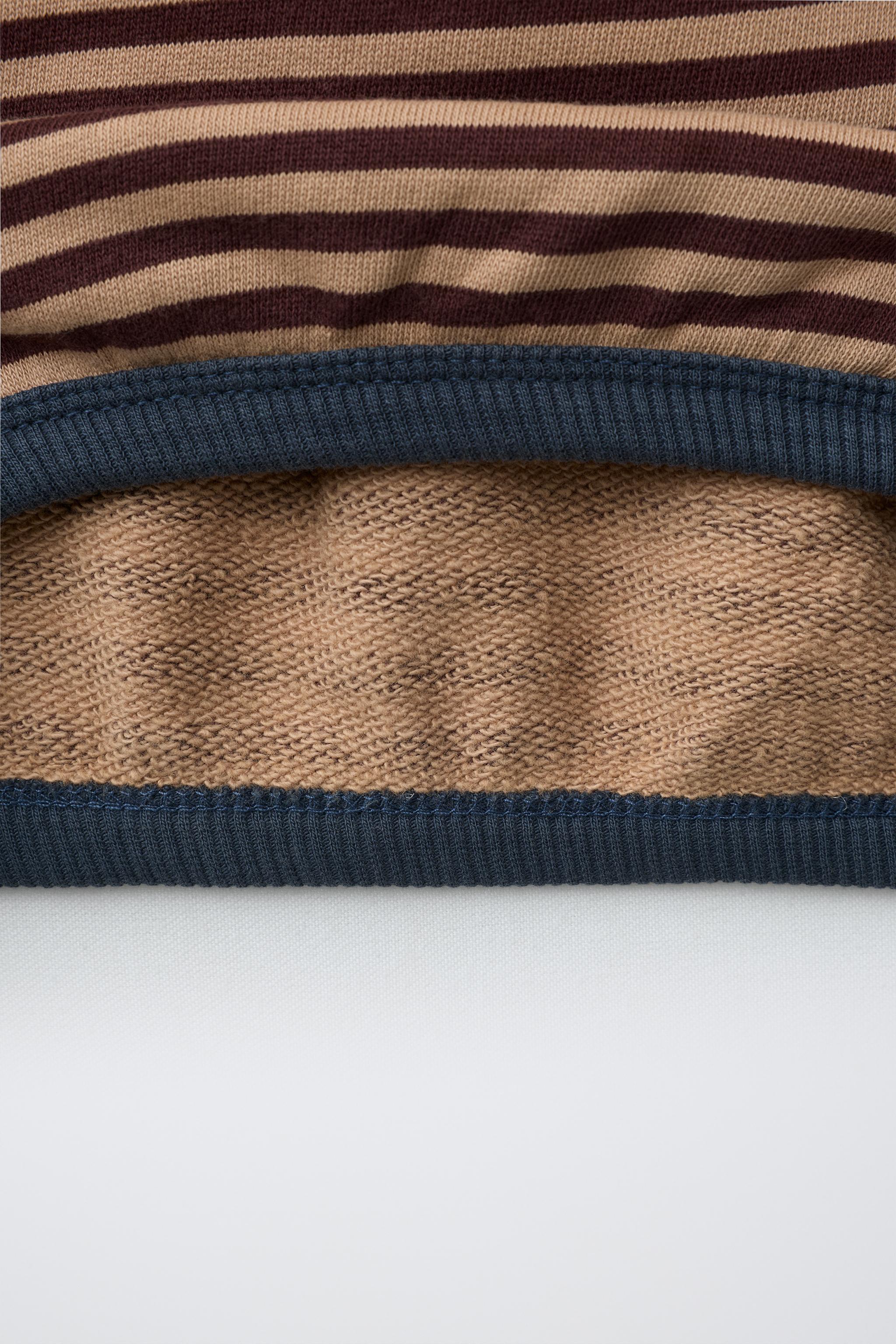 STRIPED PRINT SWEATSHIRT