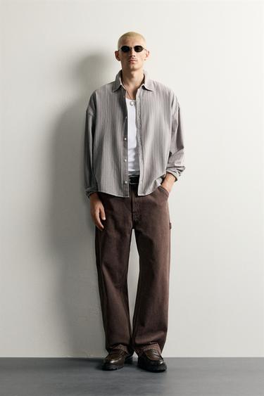 JEANS RELAXED FIT BOLSILLO CARPINTERO - Marrón de Zara - Imagen 0