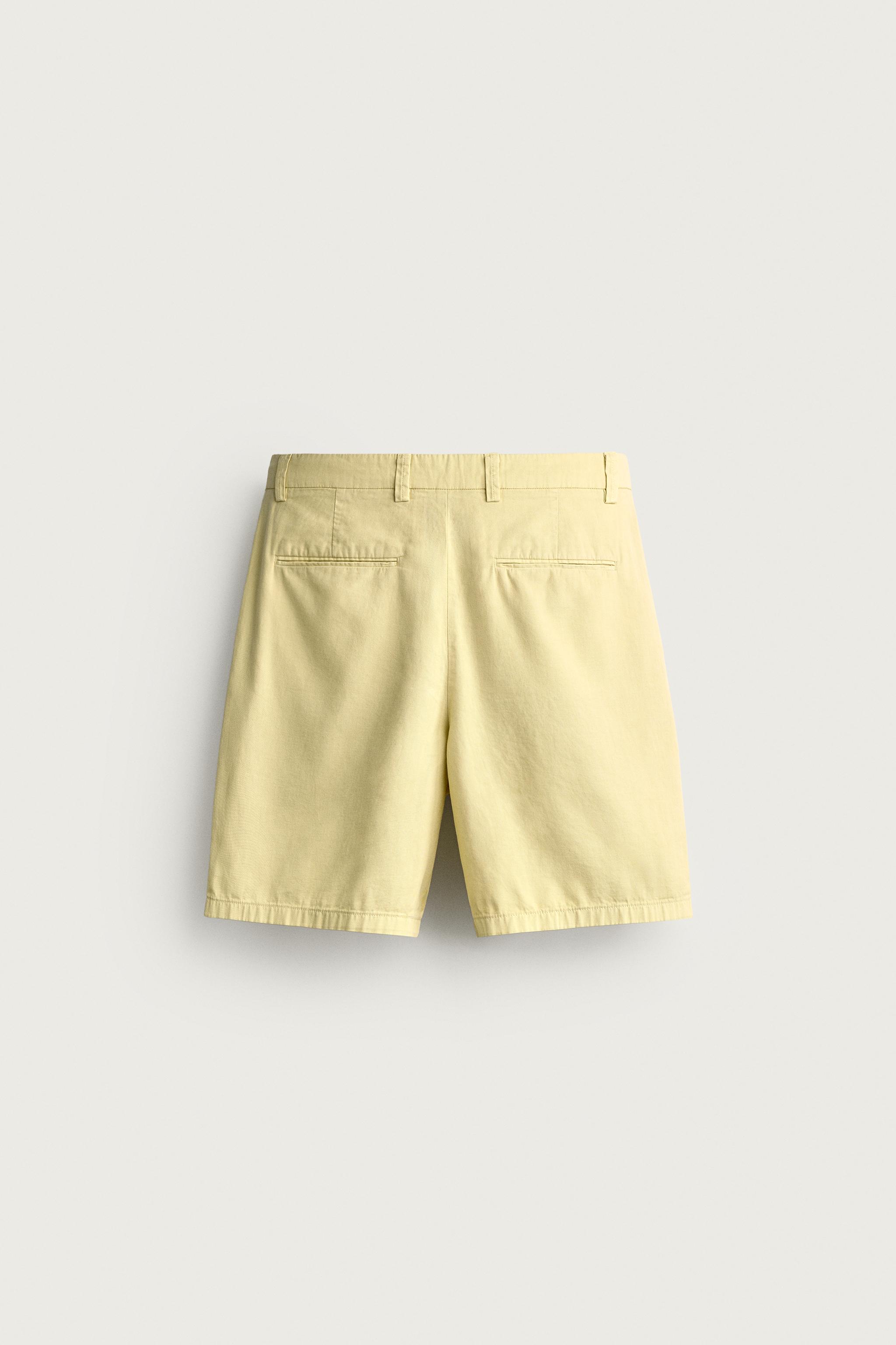 REGULAR FIT PLEATED BERMUDA SHORTS