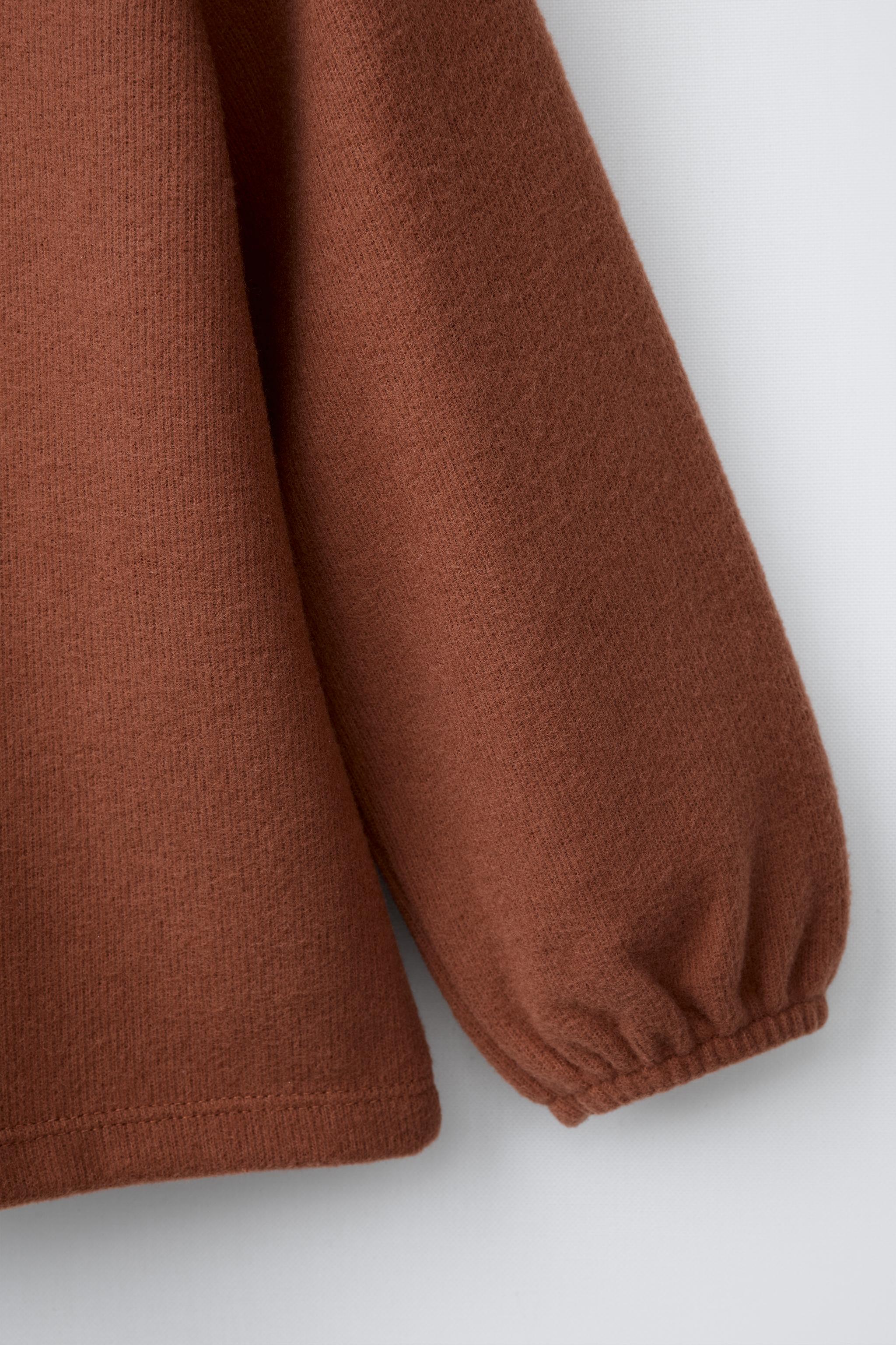 HAUT SOFT TOUCH COL BRODÉ
