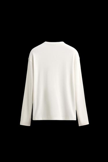 TEXTURED T-SHIRT WITH RIBBED COLLAR AND BUTTONS - White by Zara