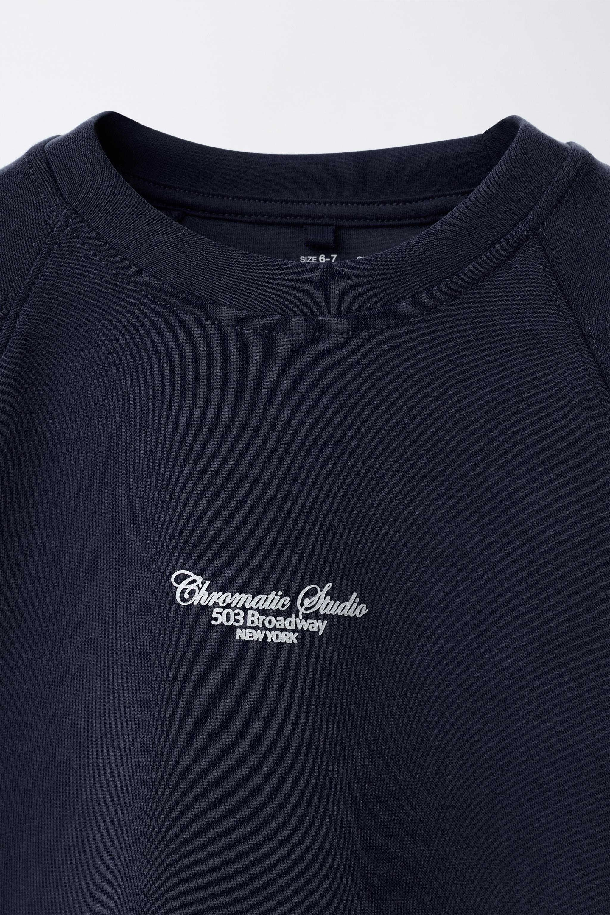 RAISED TEXT SWEATSHIRT