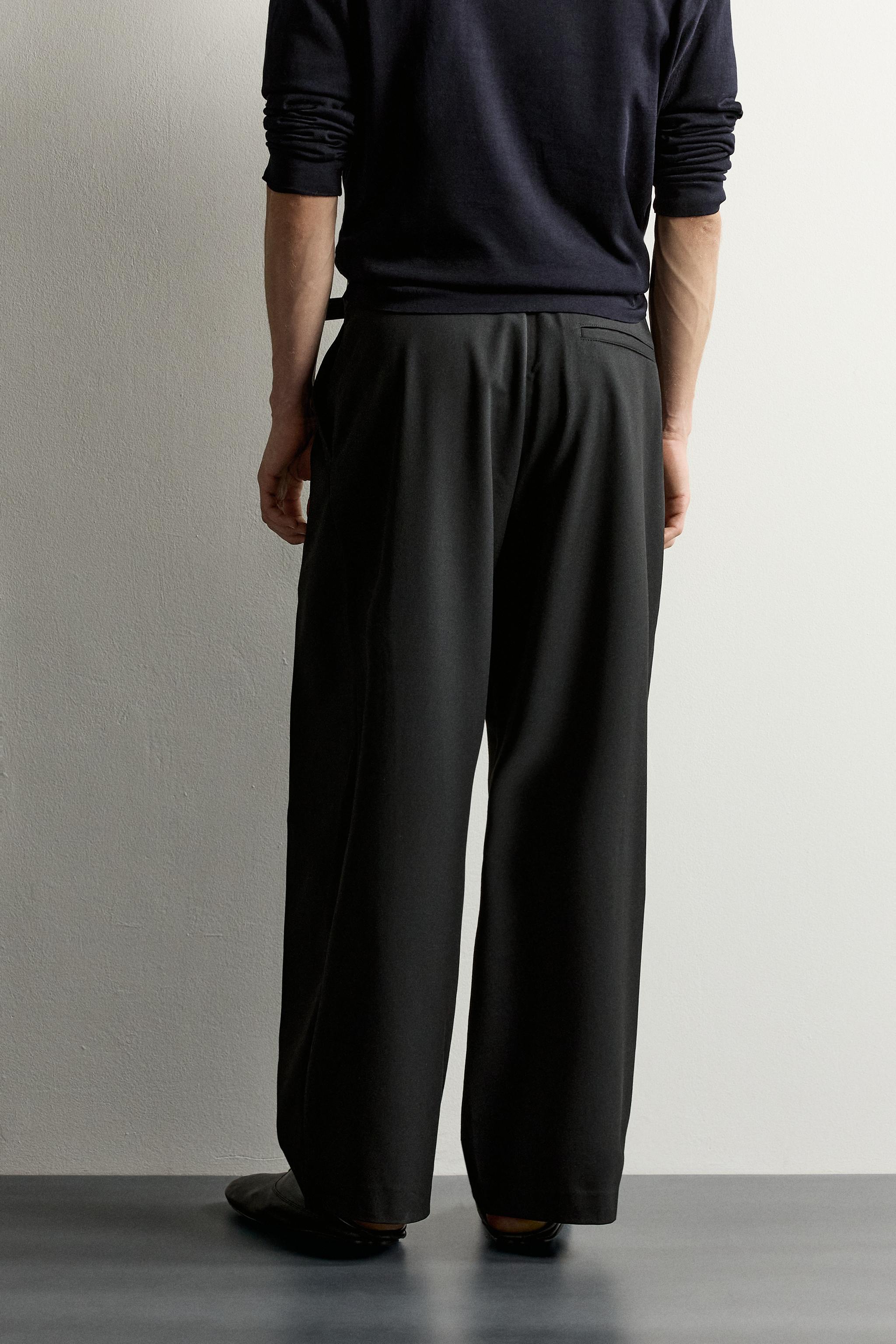 PLEATED RELAXED-FIT PANTS