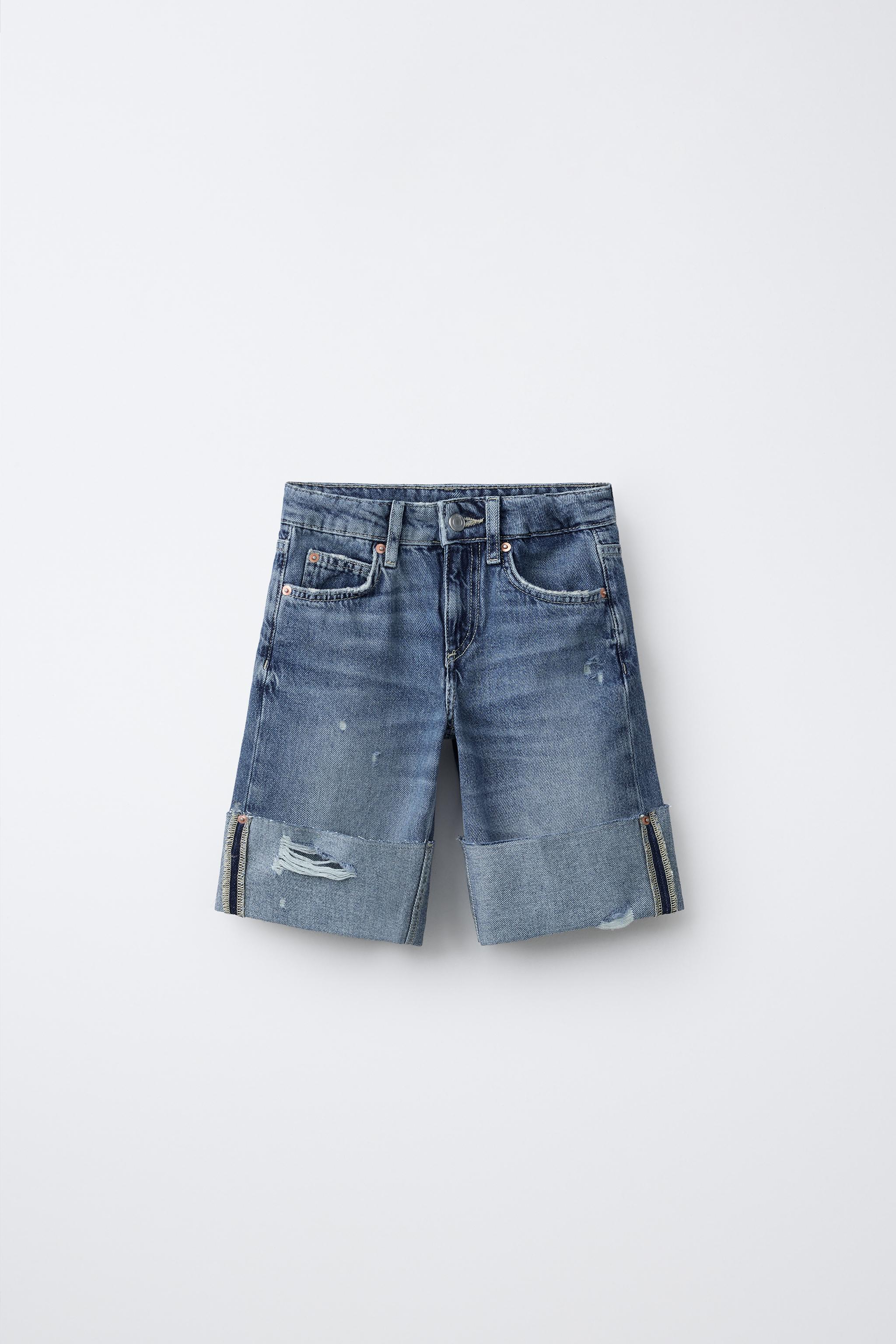 SHORT EN JEAN LONG DÉCHIRURES
