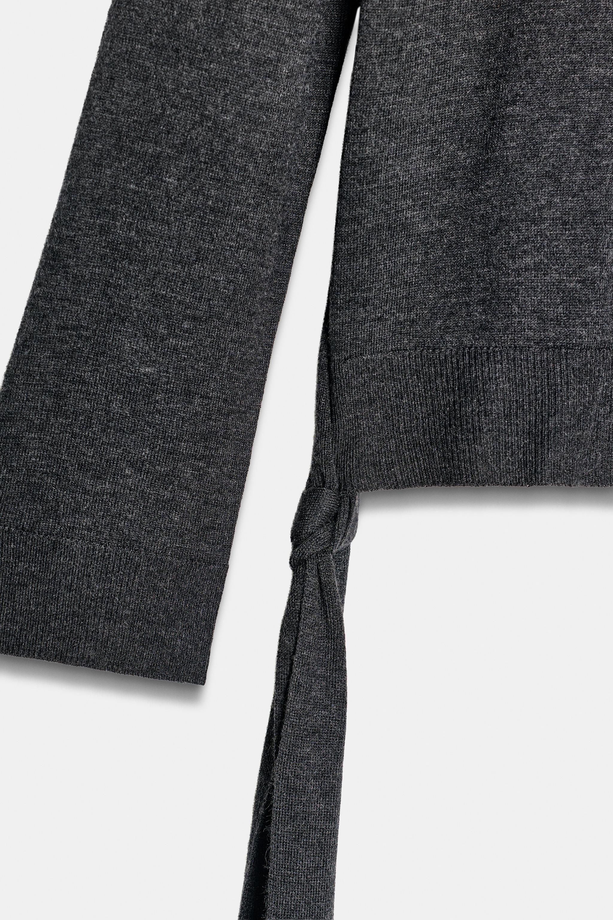 PLAIN KNIT JUMPER WITH SIDE STRAPS