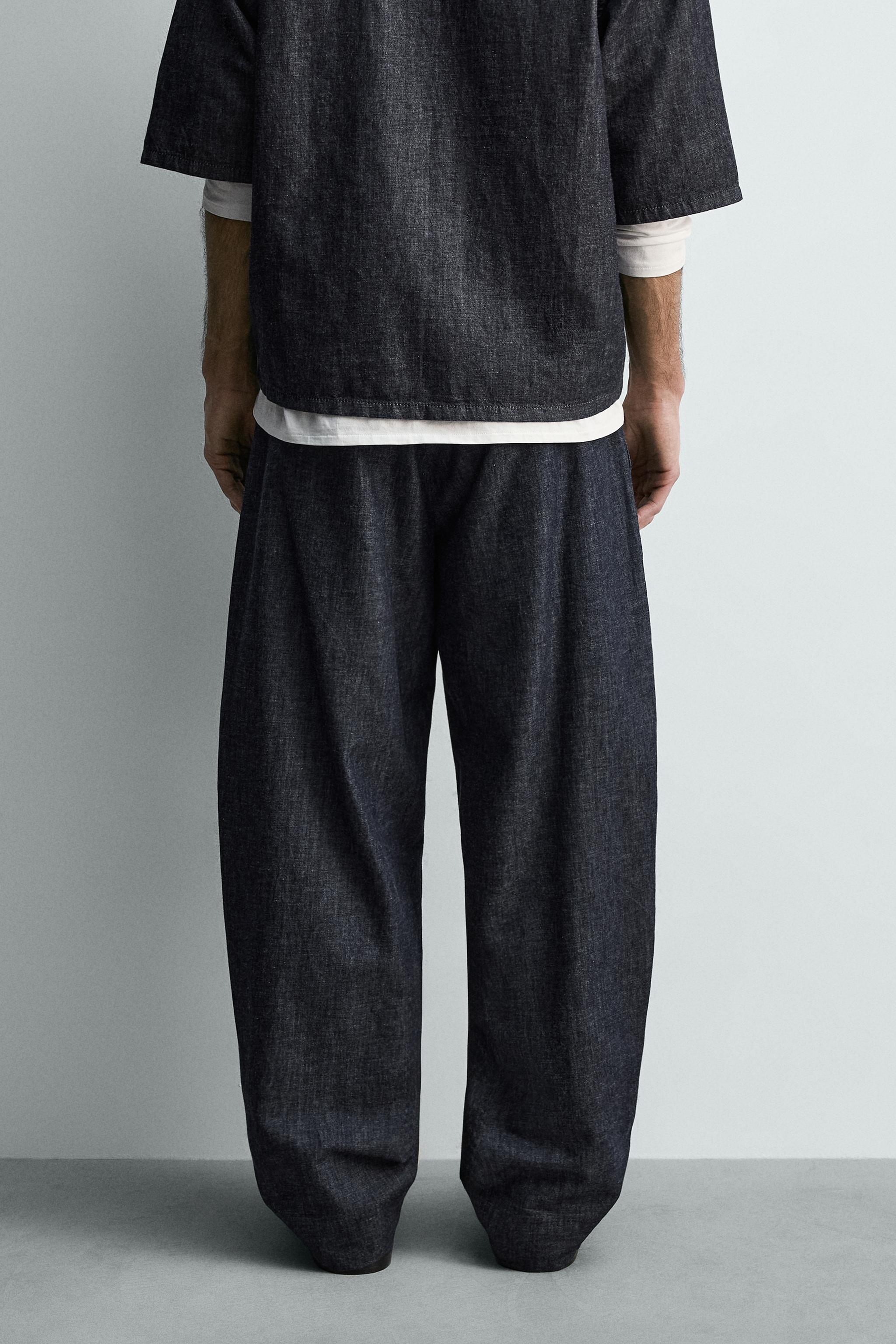 BALLOON FIT PLEATED PANTS