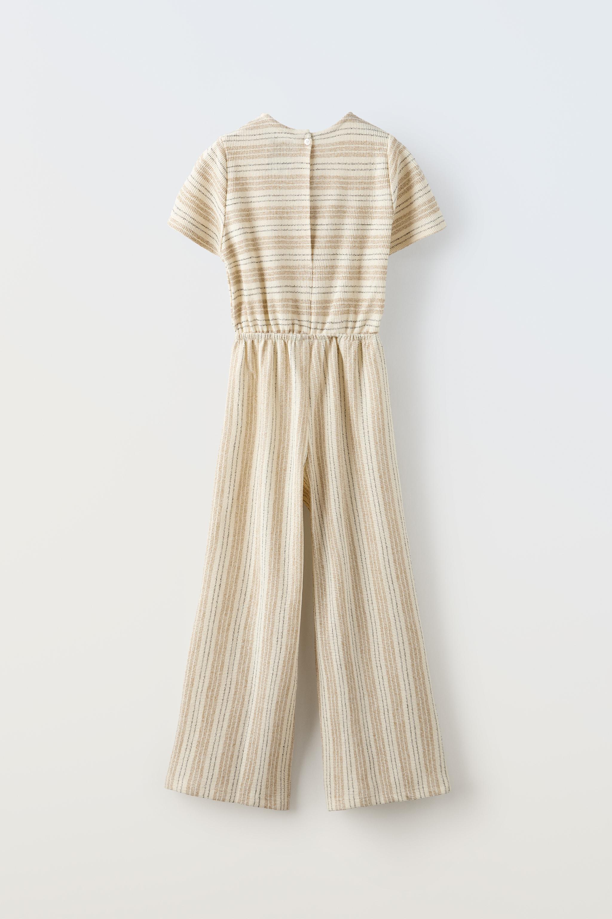 Striped jumpsuit 2024 with buttons