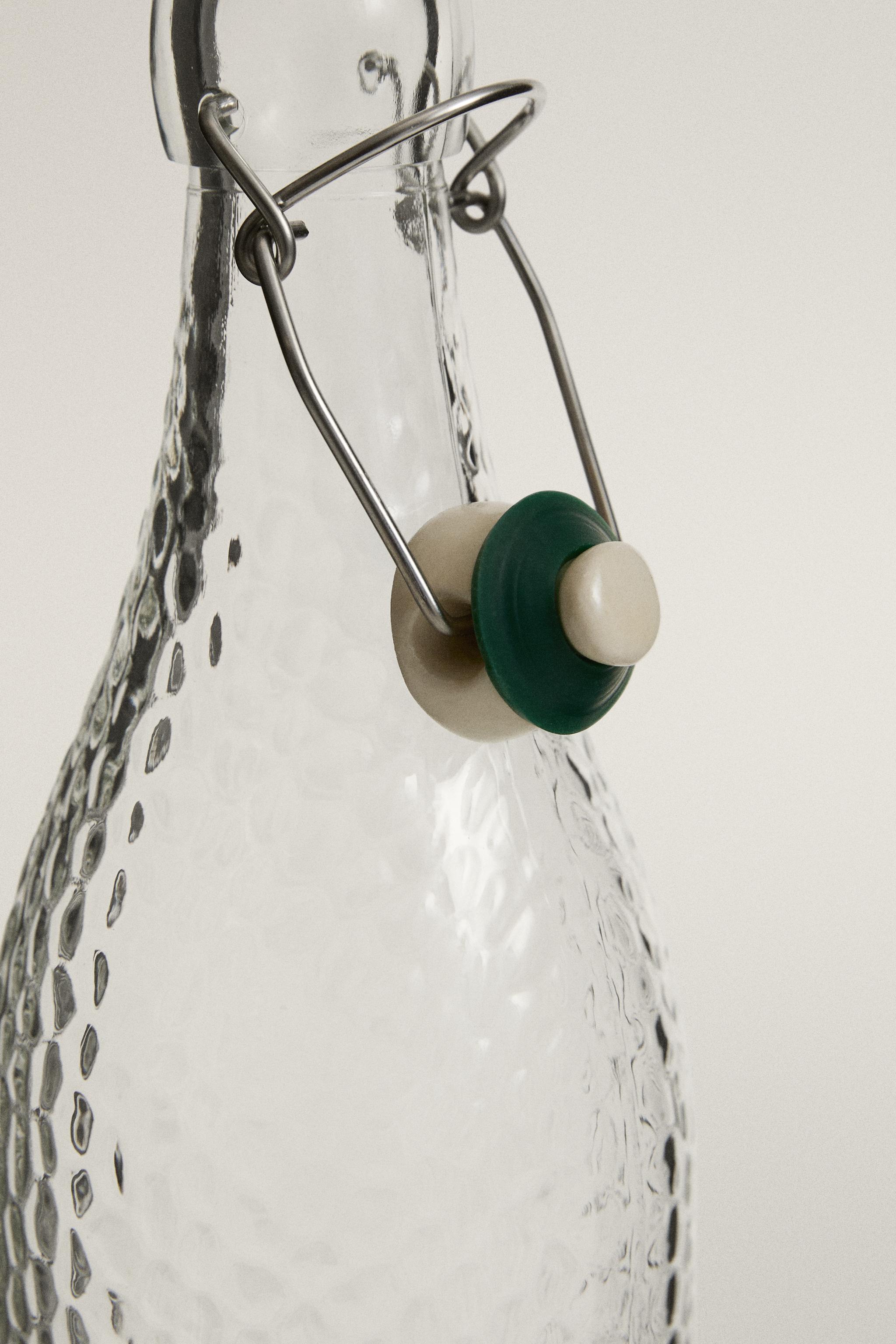 BOTTLE WITH CERAMIC STOPPER
