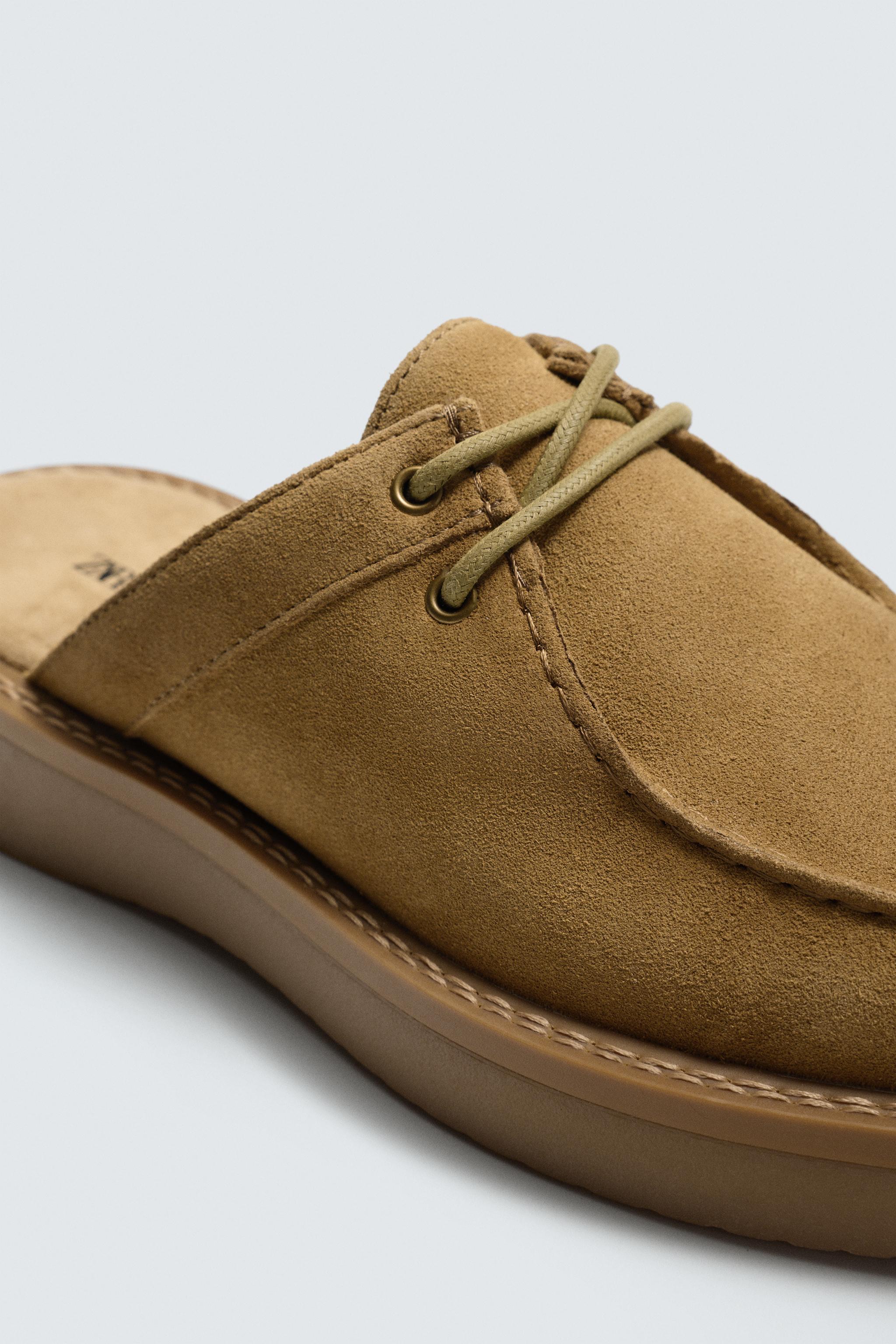 SABOTS EN CUIR