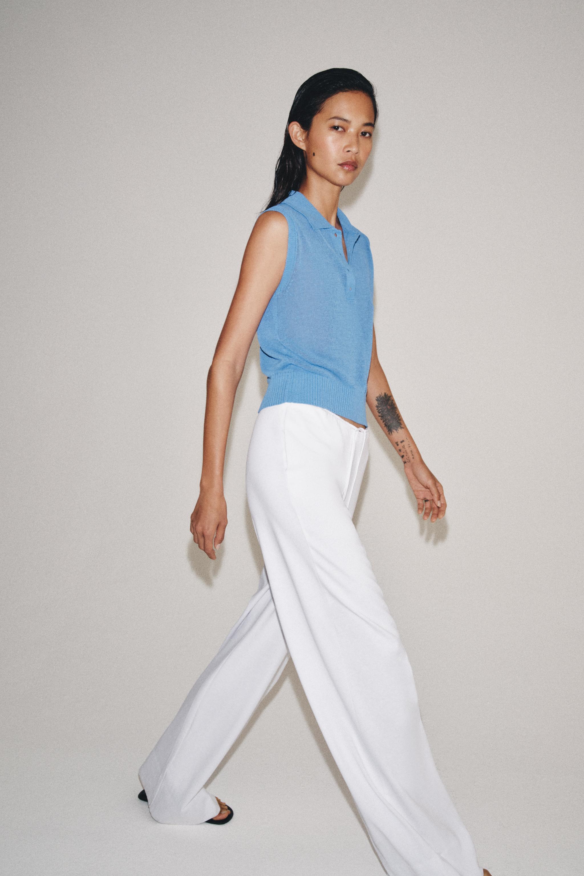 SLEEVELESS KNIT POLO